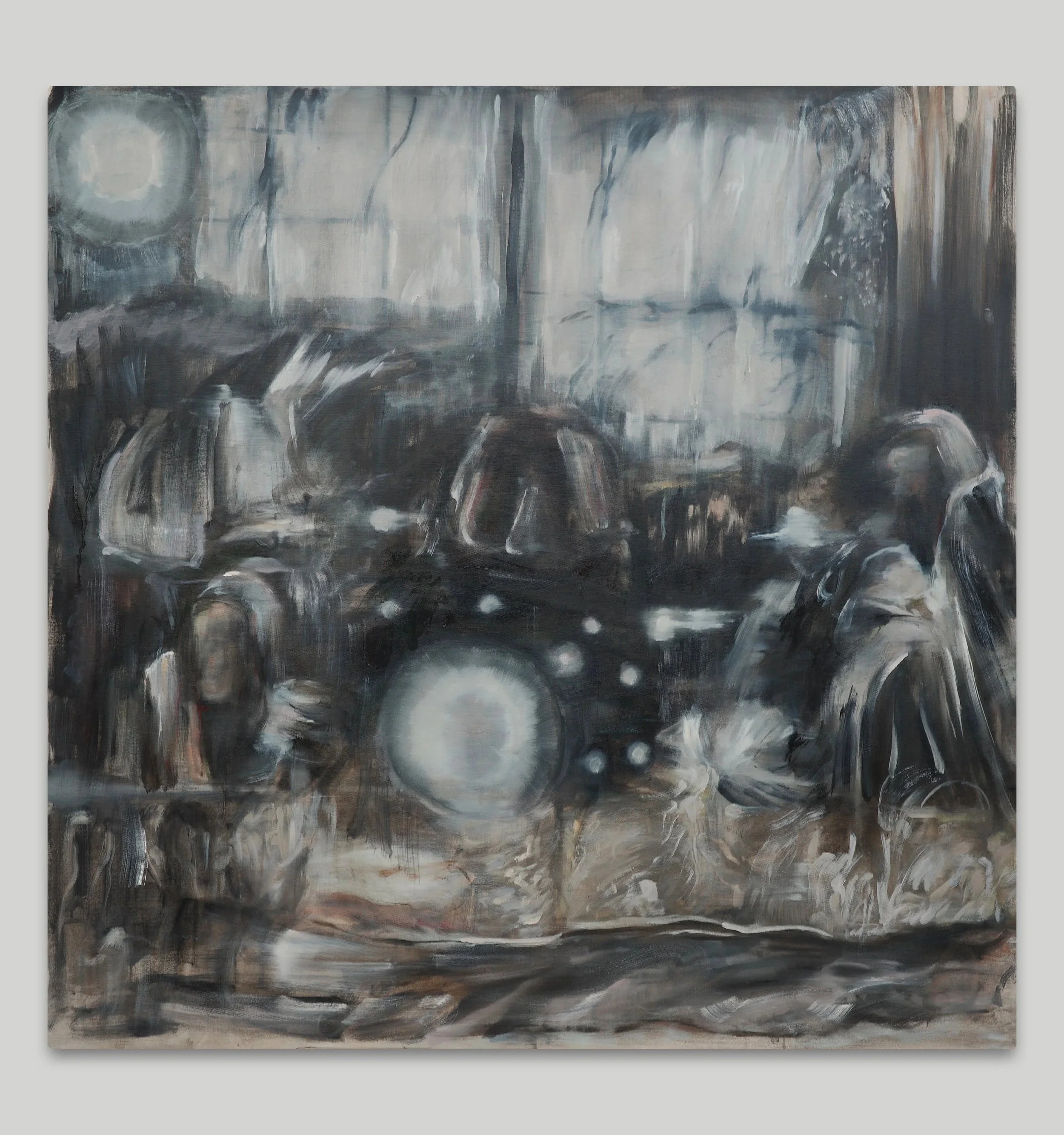 A hazy grey interior with a gridded window-like structure, a pale circular light and forms obscured by smoky layers of paint.