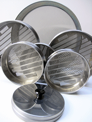 Set of six French press coffee makers with metal mesh filters, arranged in a semicircle on a white surface.