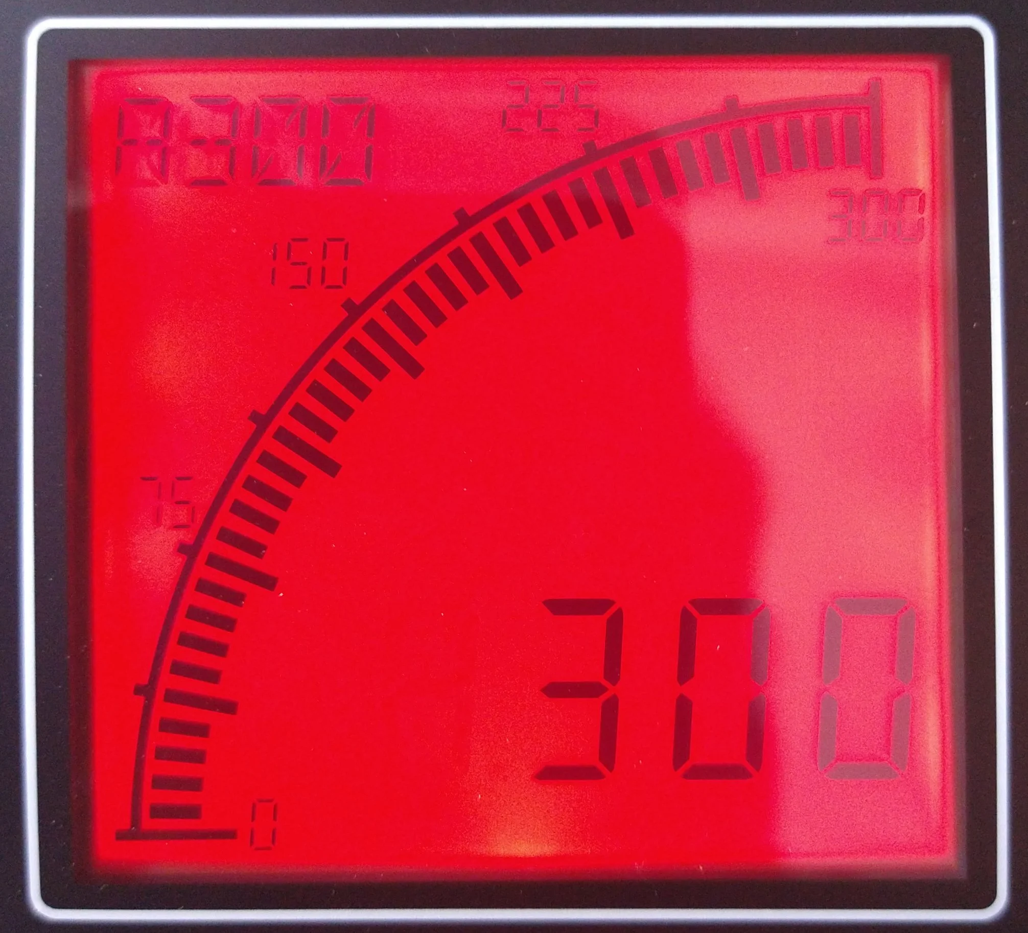 Red digital score display on an electronic device showing various numbers, including 20.0, 16.0, 55, 70, and 33 with a curved scale.