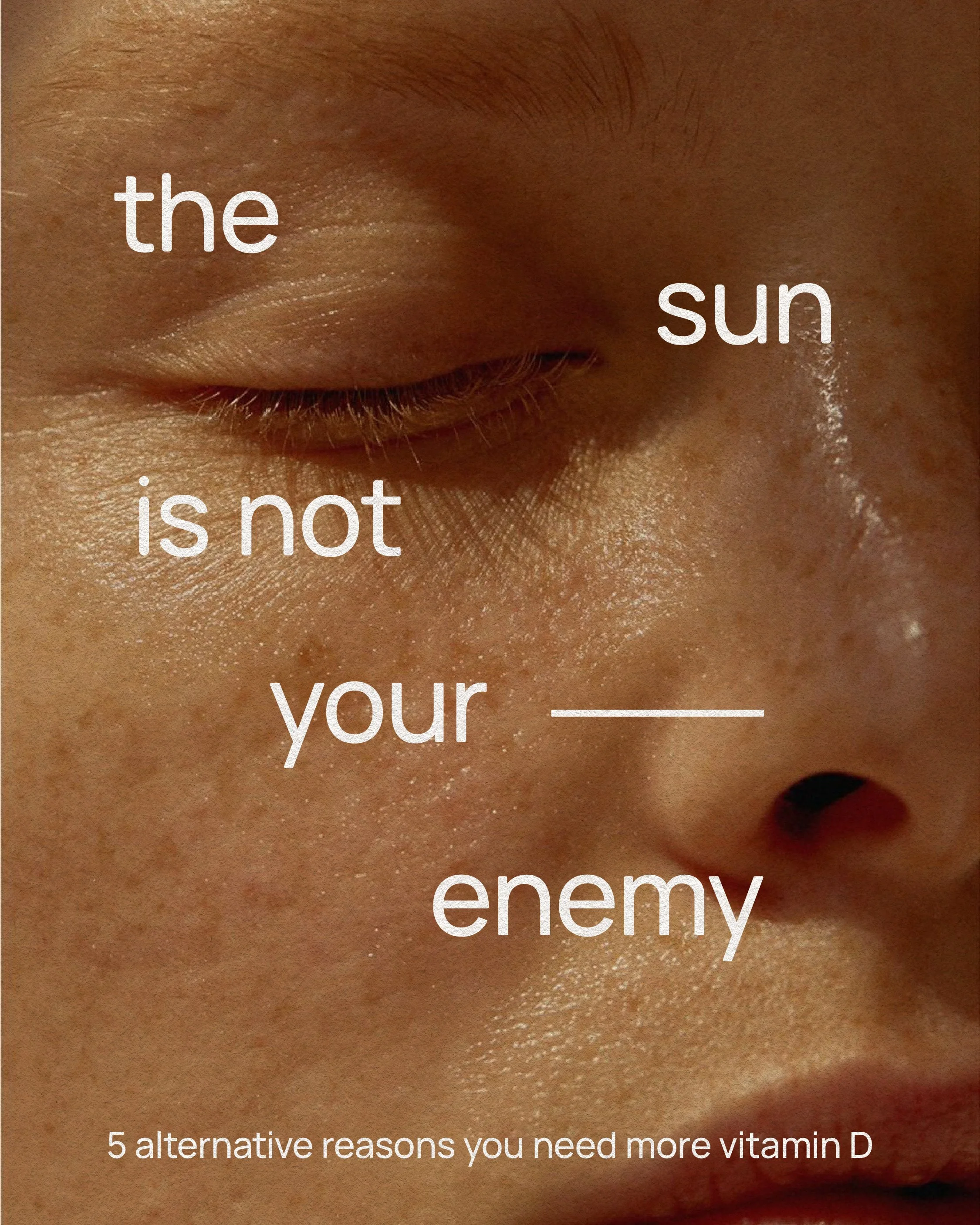 Close-up of a person's closed eye, with visible eyelashes and skin texture, overlaid with text that reads, 'the sun is not your enemy'.