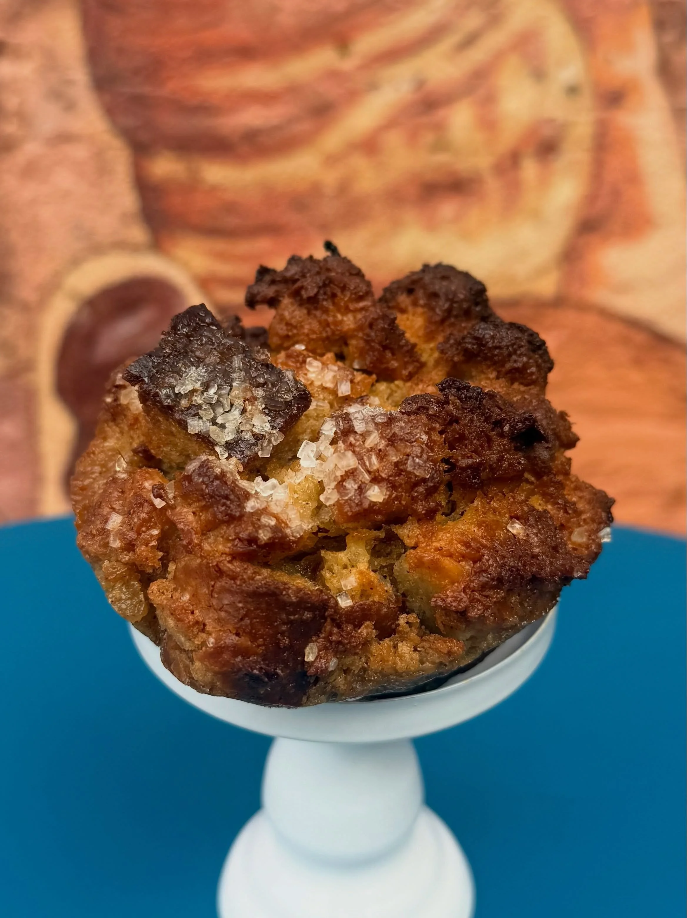 ❤️&zwj;🔥 BREAD PUDDIN&rsquo; ❤️&zwj;🔥

We&rsquo;re big believers in using almost every bit of food we can. Instead of tossing extra cuttings of perfect and delicious dough, we repurpose them into new products! Bread Puddin&rsquo; is one example, an