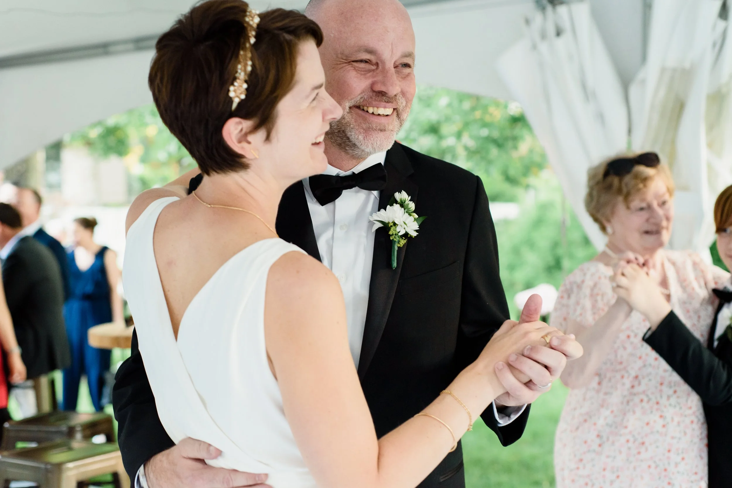 Bride and Groom smiling during dance