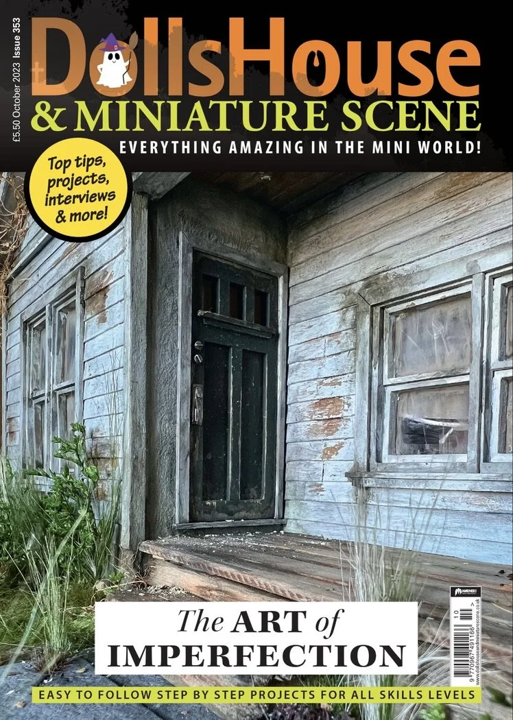 Cover of Dollshouse & Miniature Scene magazine, issue 353, featuring a weathered miniature house with broken windows, a black door, and overgrown grass.