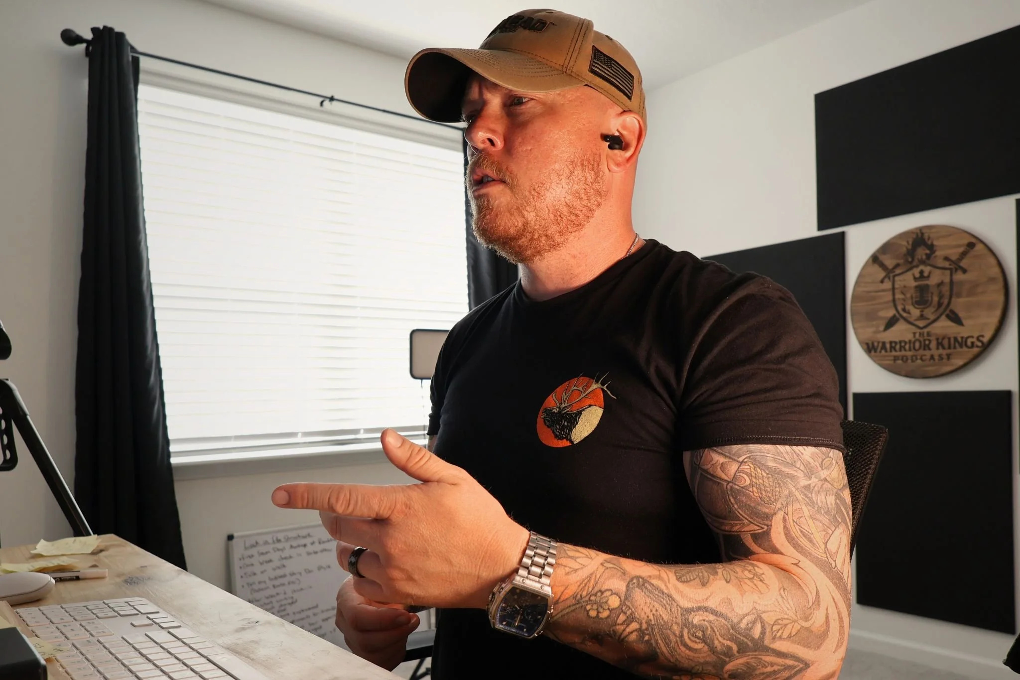 Michael Riggs conducting a 1-on-1 marriage coaching call for men in his studio