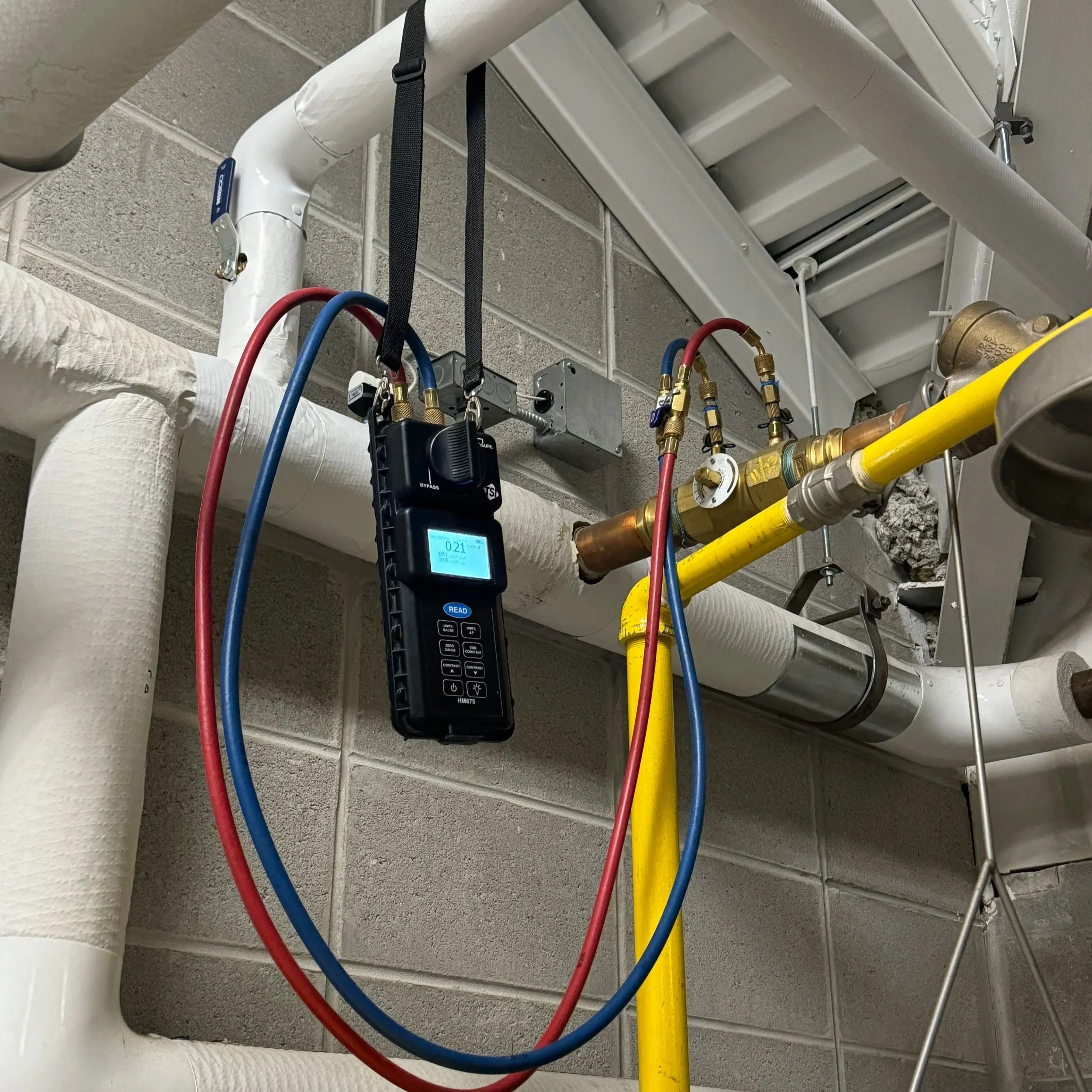Water meter reading hot water flow within HVAC water system to ensure correct temperatures, flow and balance. BTI Milwaukee's best air and water balancers for your commercial or residential needs.
