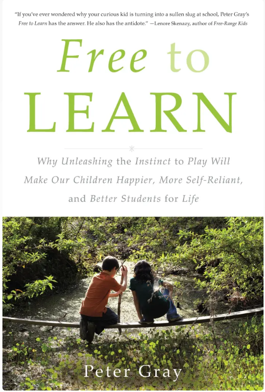 Book cover titled 'Free to Learn' by Peter Gray, featuring a photograph of two children sitting on a log in a wooded area, engaging with each other.