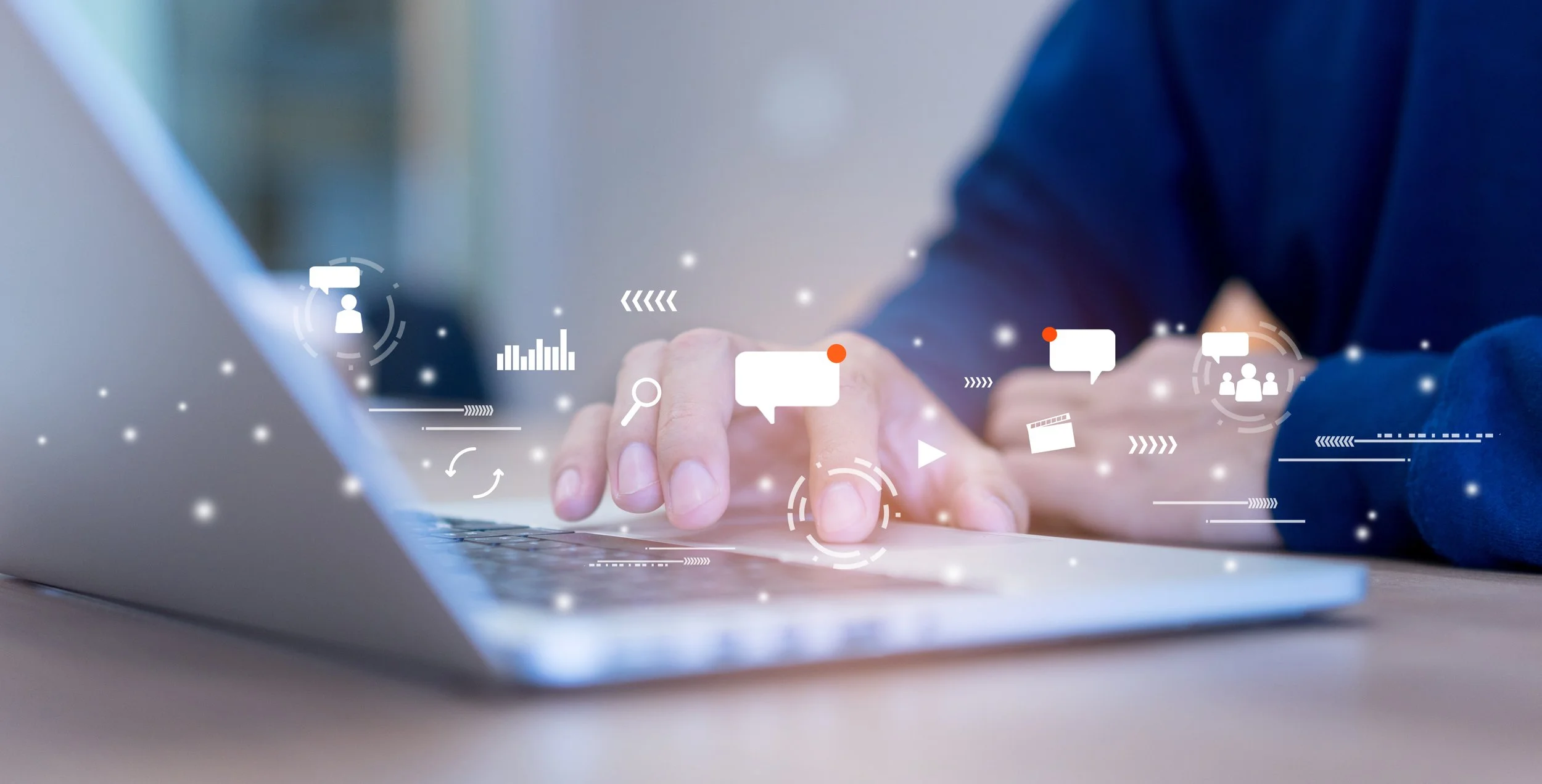 Laptop with social media marketing graphics displayed