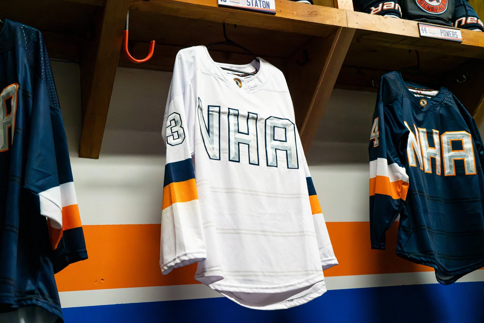 A white hockey jersey with the number 36 and