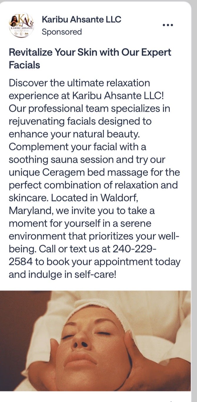 A woman receiving a relaxing facial massage with her eyes closed, lying on a treatment bed, at Karibu Ahsante LLC.