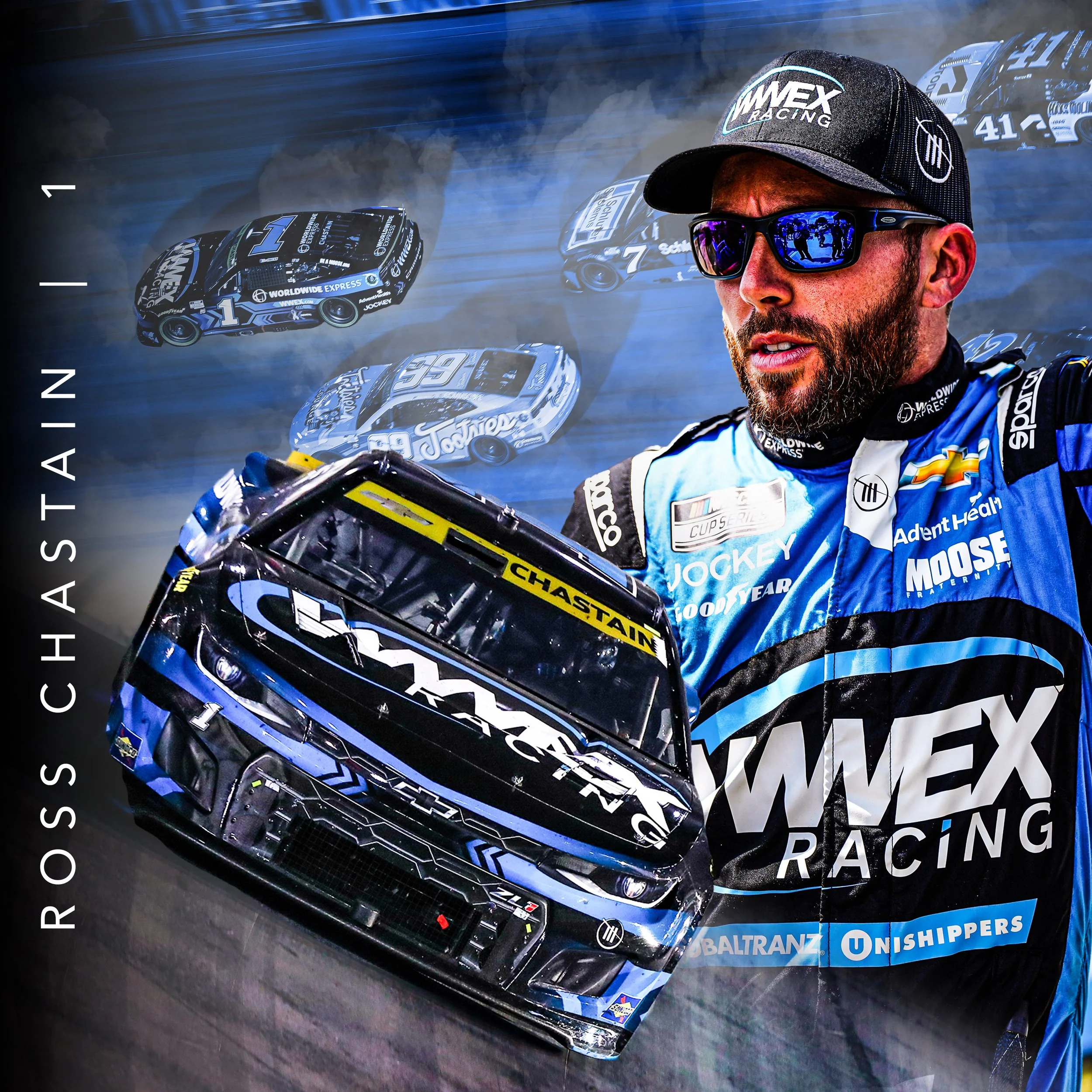 Close-up of a race car driver with sunglasses and a black cap labeled 'WNEX RACING,' standing next to a blue race car with various sponsor logos, on a racing track blurred with motion.