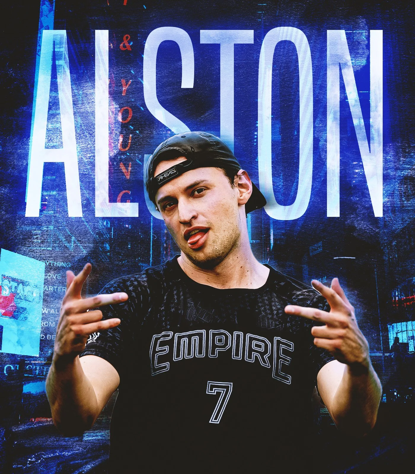 A young man making a peace sign with both hands in front of a large neon sign that reads 'Aston' and has smaller text 'and' and 'you' nearby. He is wearing a black cap, a black t-shirt with the word 'Empire' and the number '7' on it, and is sticking out his tongue.