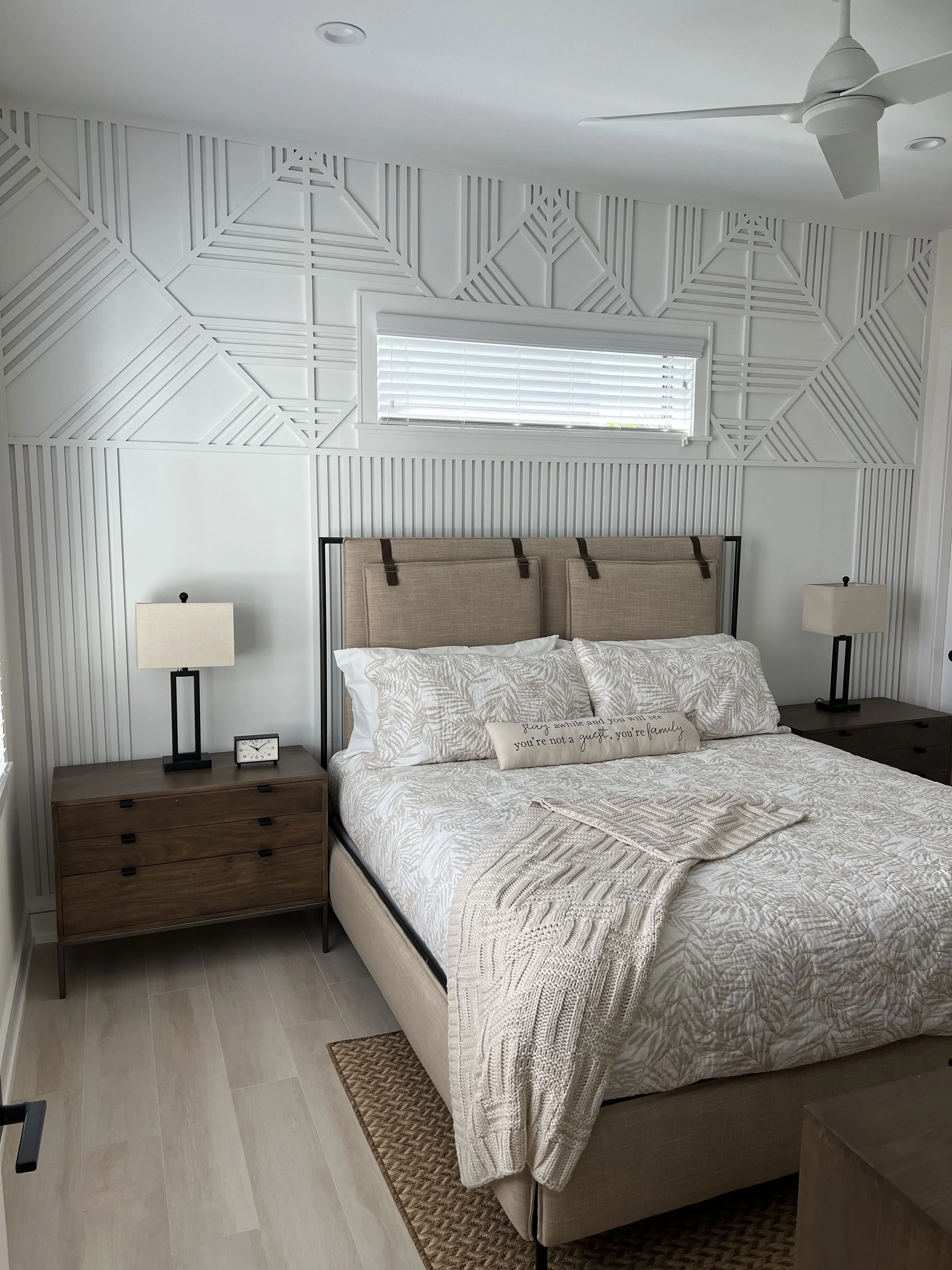 White geometric bedroom wall treatment — Project 07.
