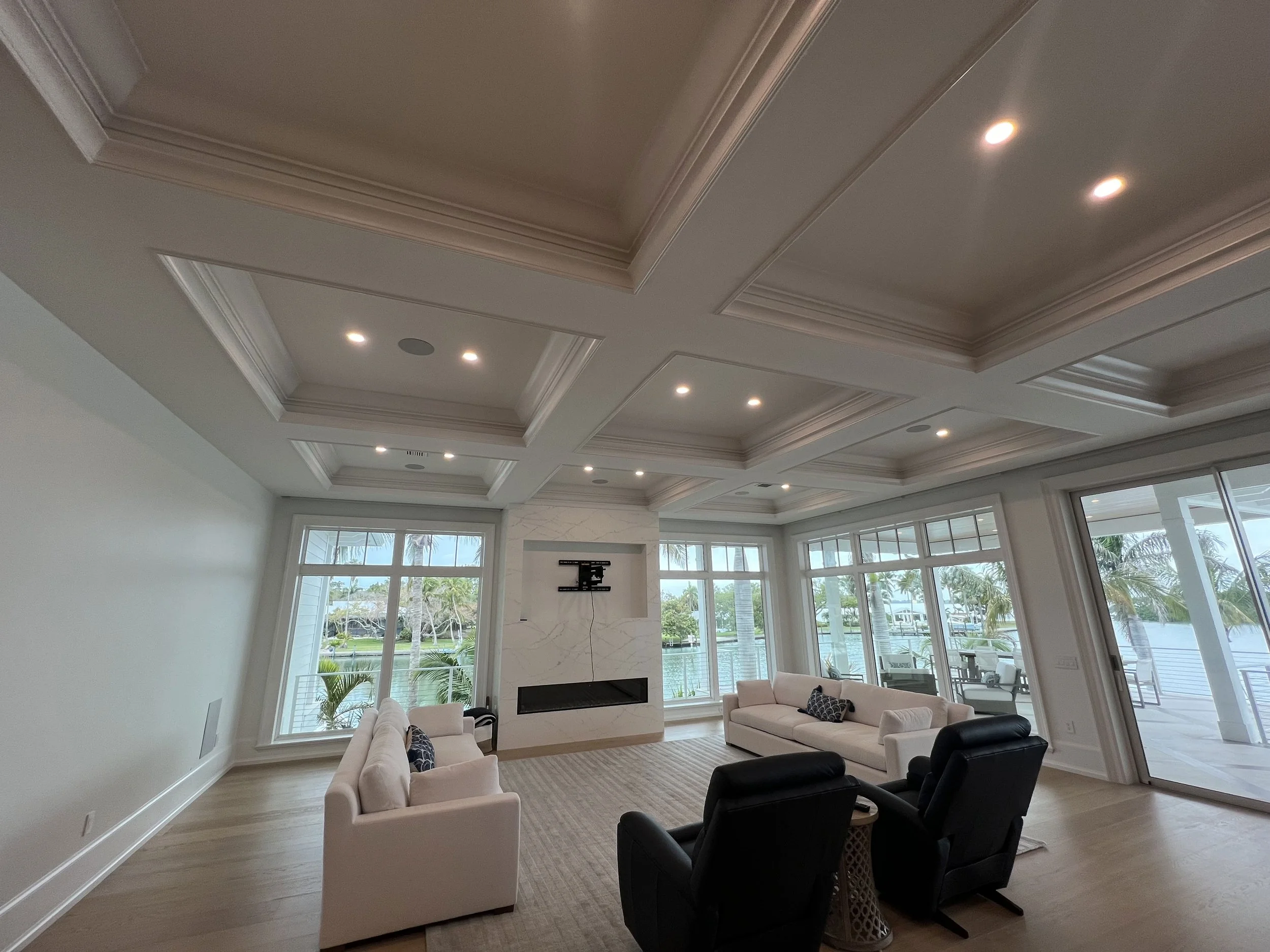 Coffered living room ceiling and detailed wall trim — Project 06.