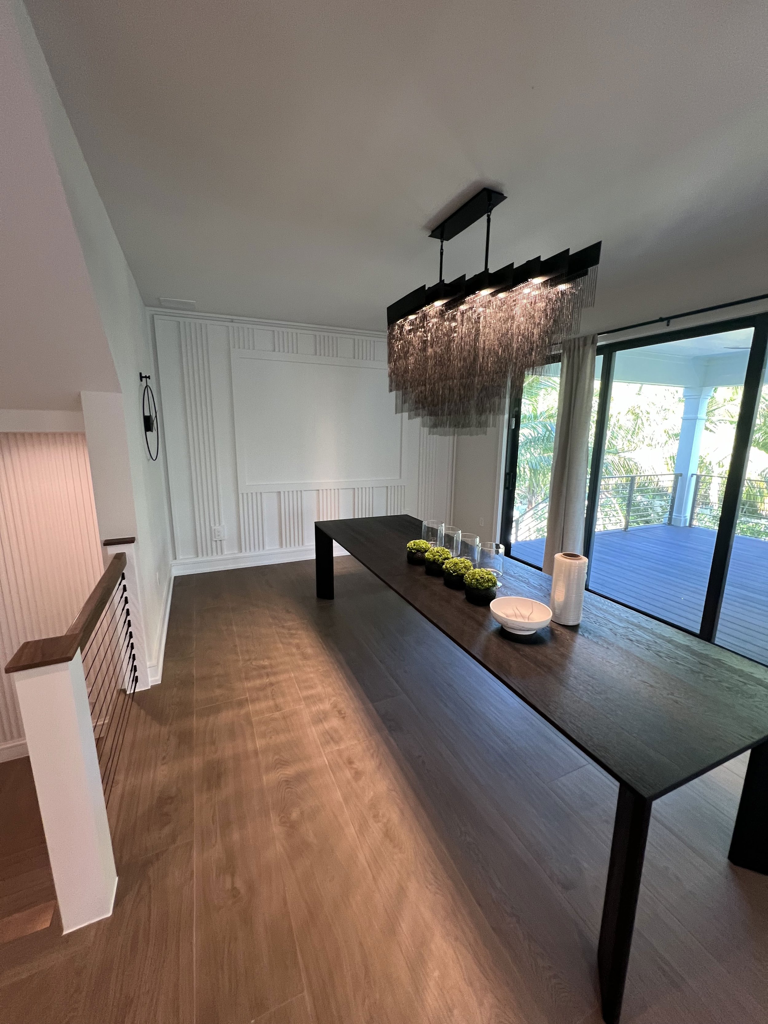Dining room with decorative wall paneling — Project 08.