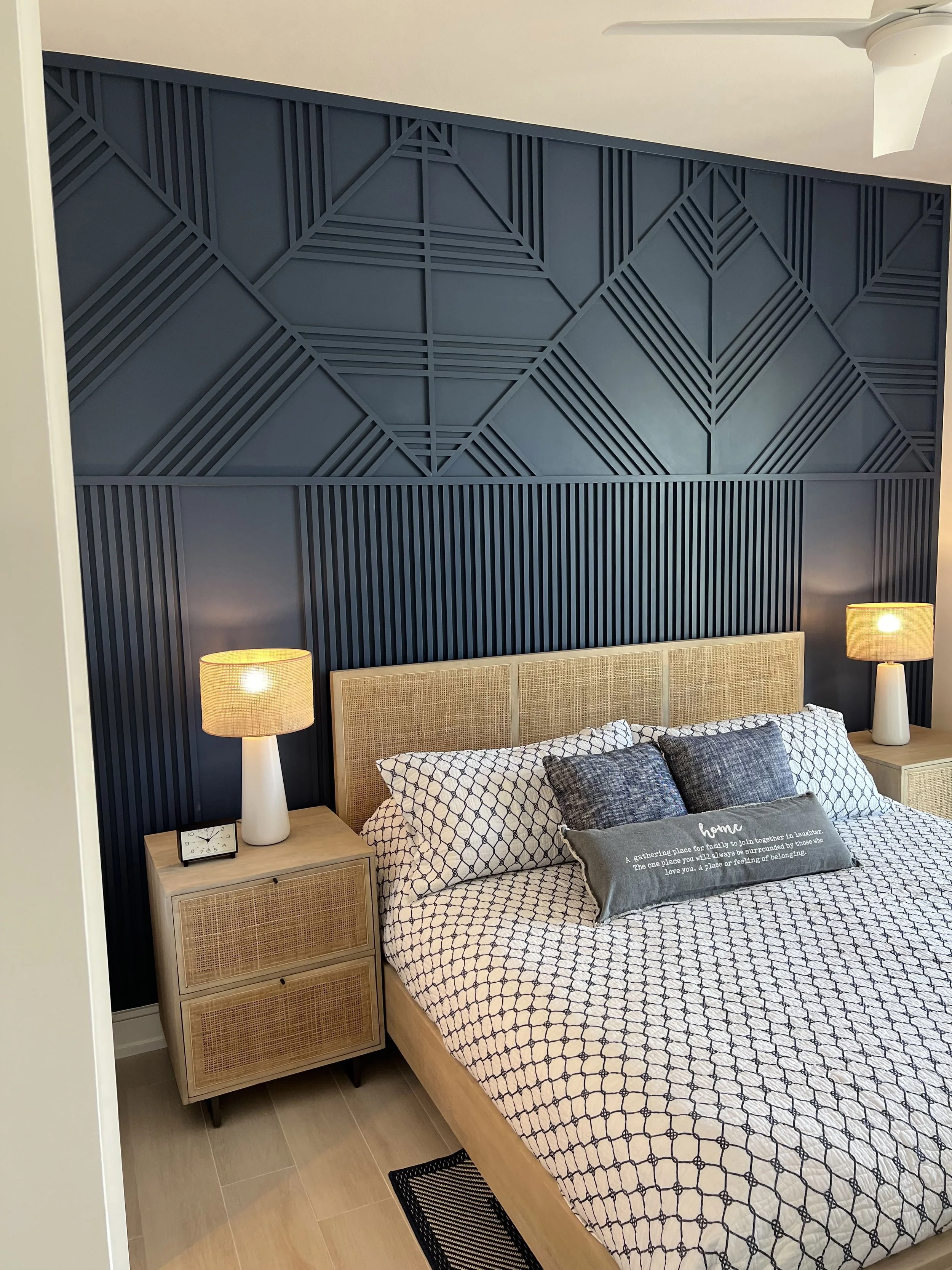 Blue geometric wood accent wall and vertical paneling — Project 07.