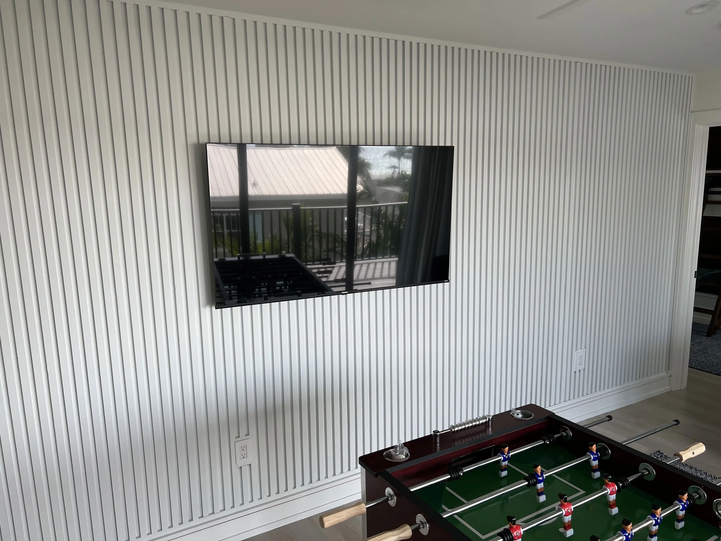 Slatted feature wall in the game room — Project 07.