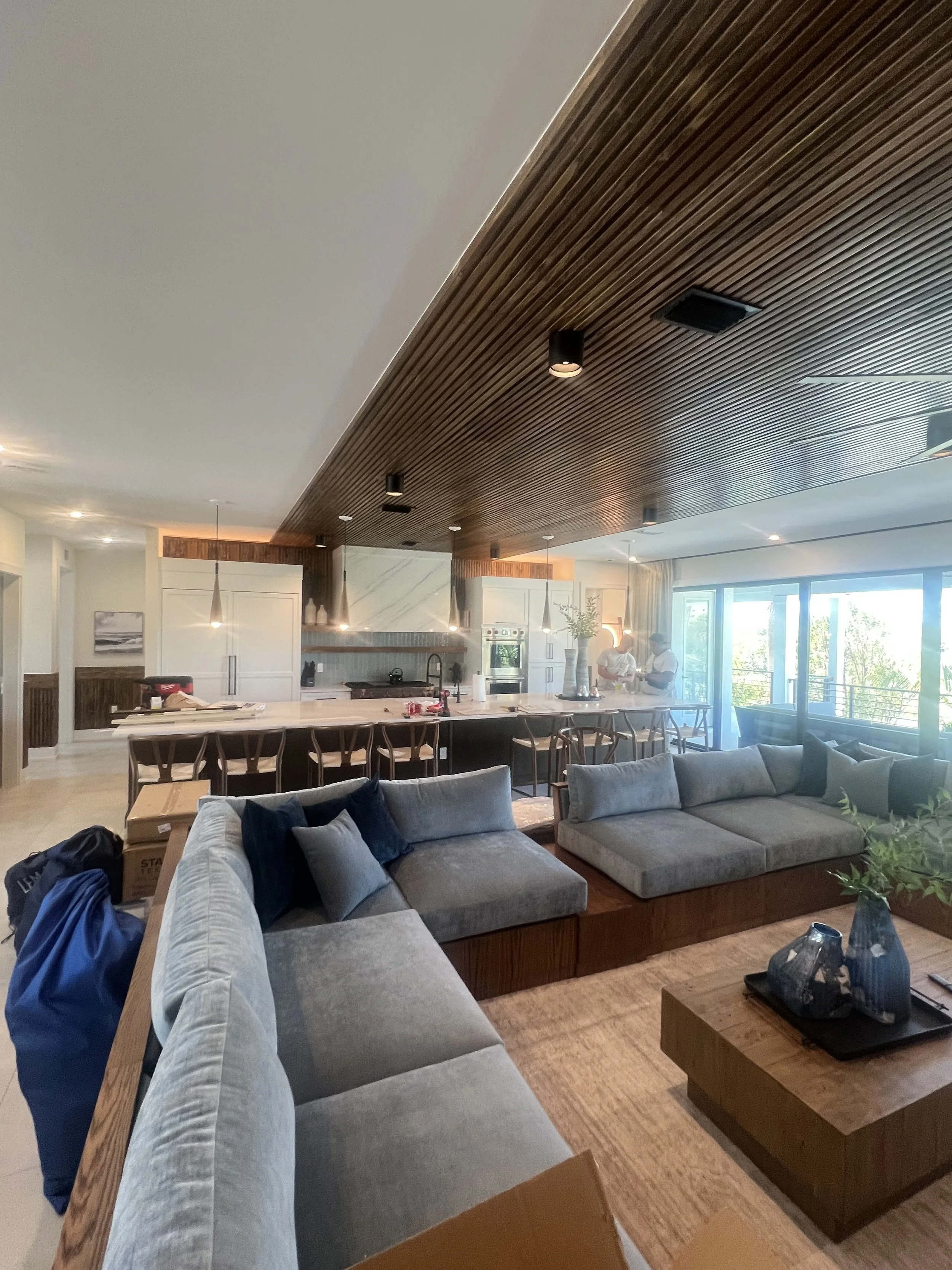 Project 01 — kitchen and living area with wood ceiling details