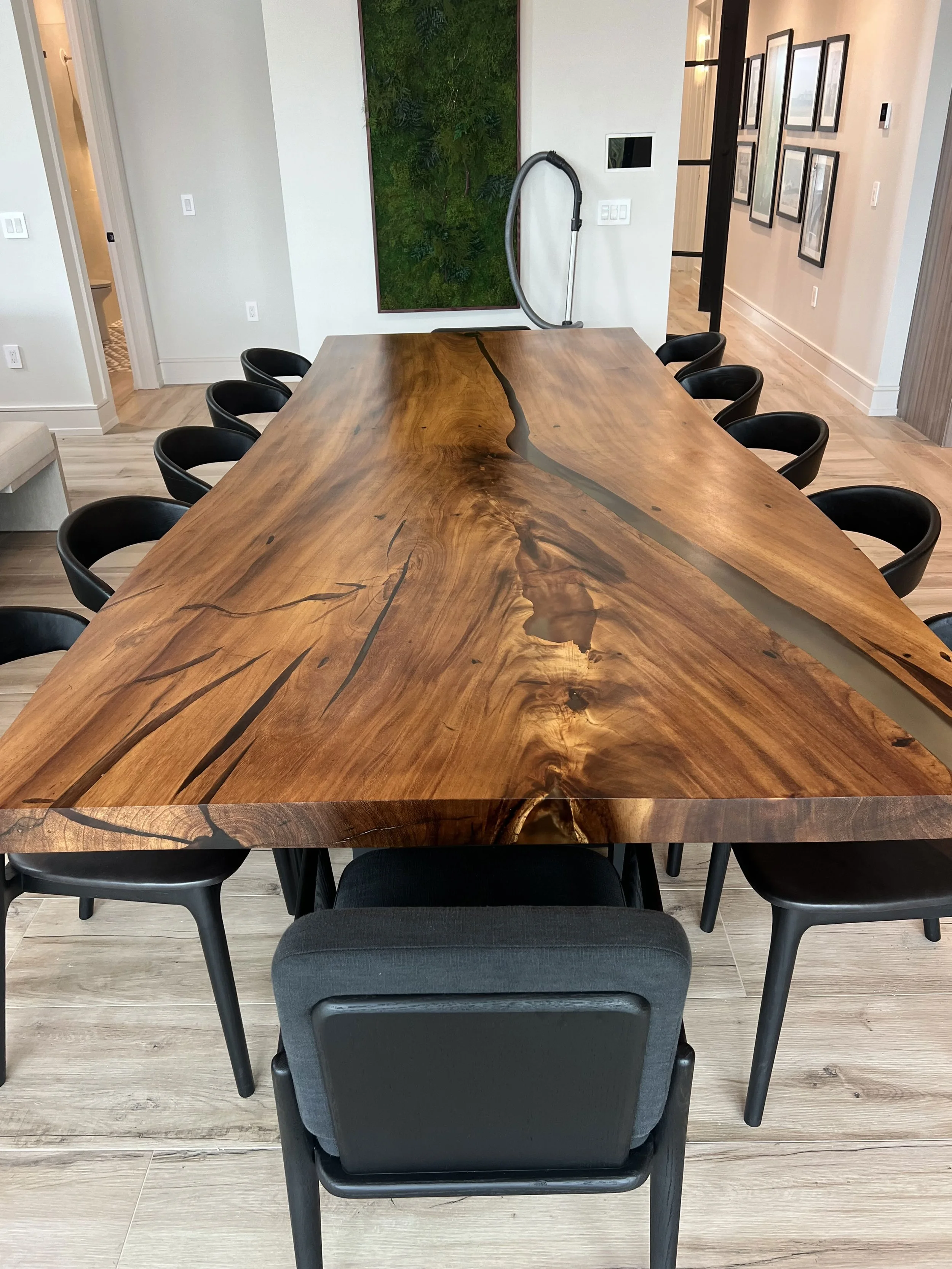 Custom wood dining table with sculpted edges and natural grain — Project 04.