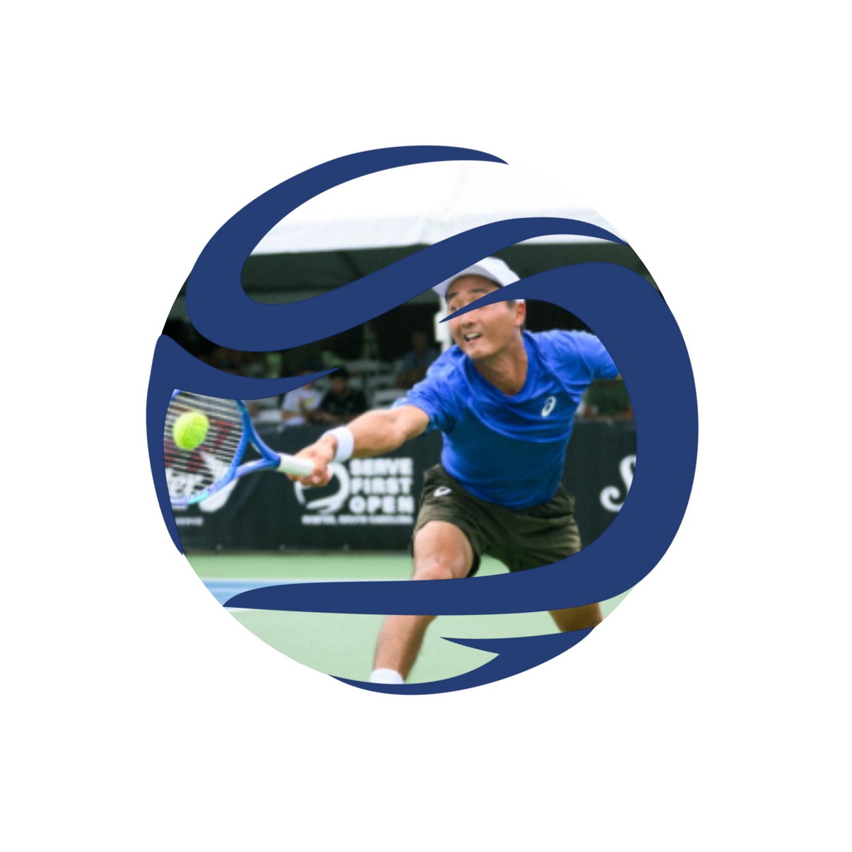 Tennis player reaching for a tennis ball with a racket during a match on a green court, with spectators in the background.