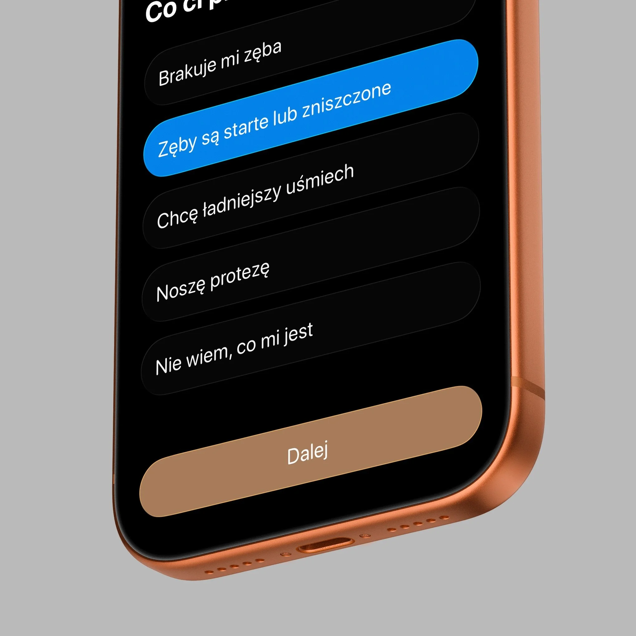 Close-up of a smartphone screen showing text message options in Polish, with one option highlighted in blue, and a copper-colored frame at the edge.