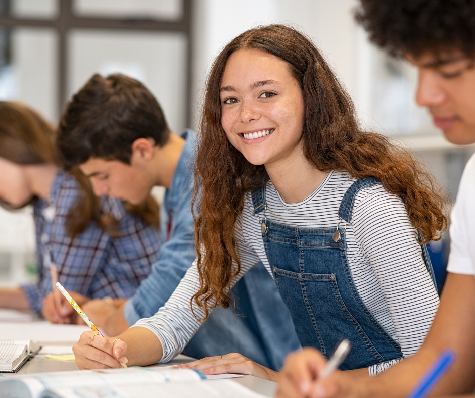 Teen Smiling During Study