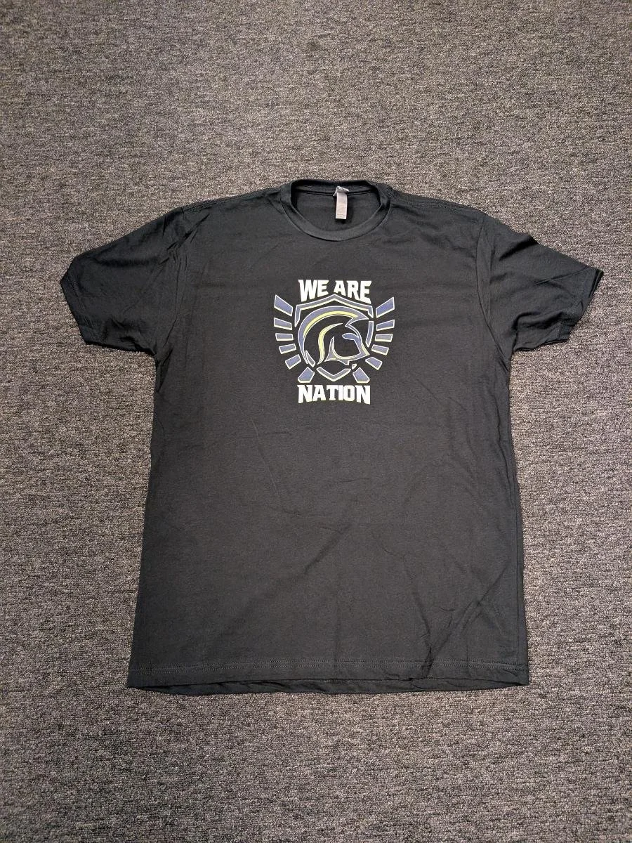 Black T-shirt with a graphic of a Spartan helmet and the text "We Are Nation" printed on the front.