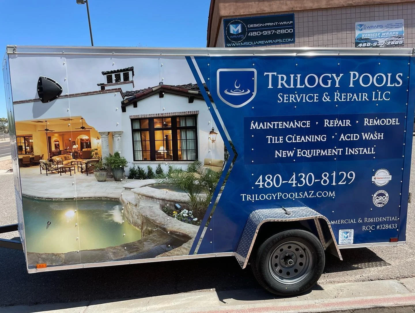 A mobile billboard truck advertising Trilogy Pools service and repair, featuring a photo of a backyard pool area with a patio, seating, potted plants, and a house interior visible through large windows. Text lists services including maintenance, repa