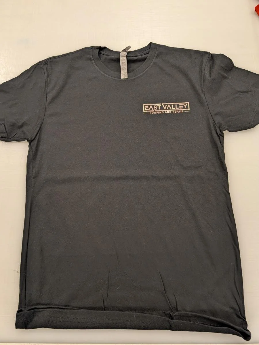 Gray T-shirt with 'East Valley Roofing and Repair' logo on the upper left chest.