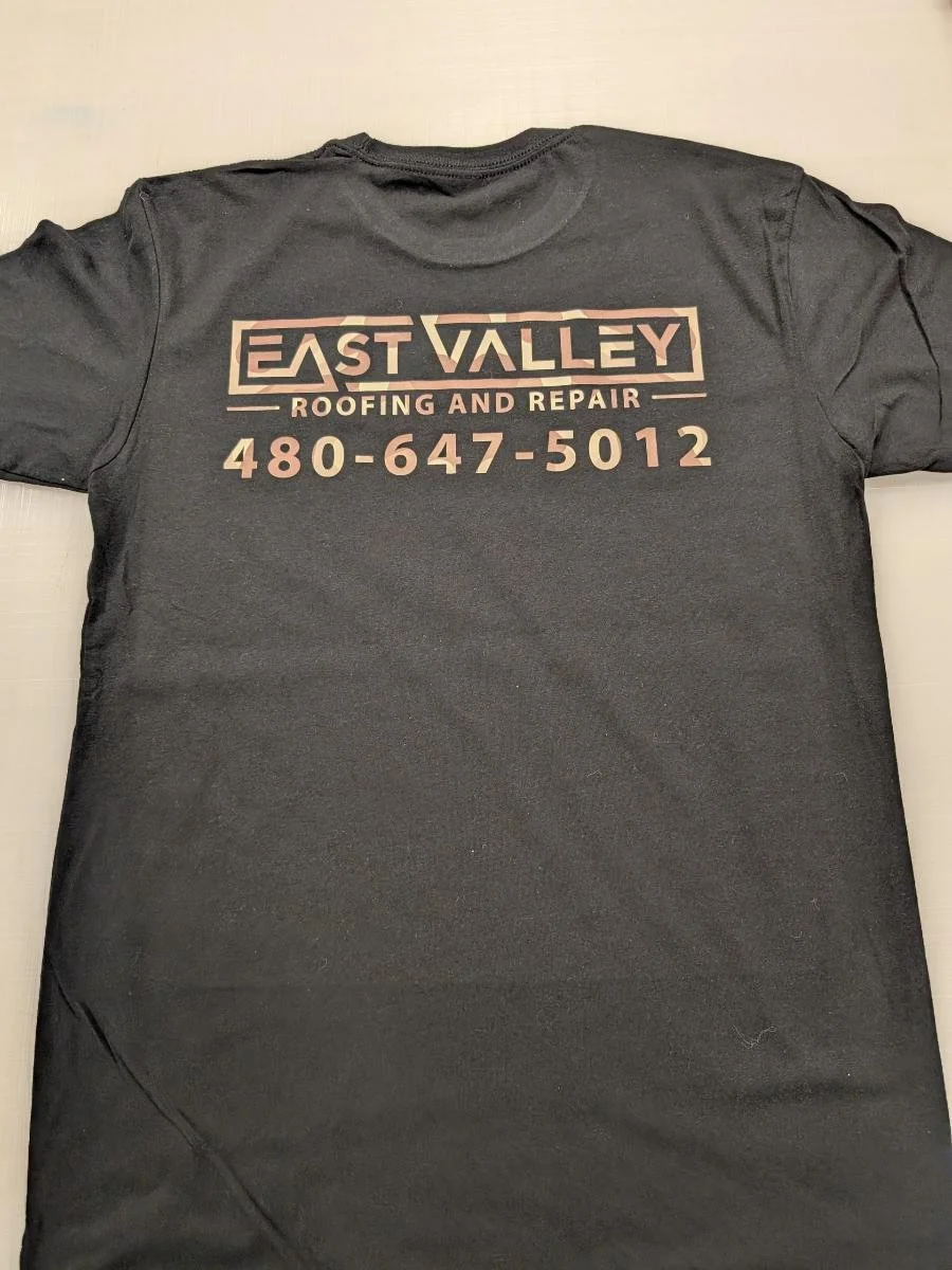 Black T-shirt with pink and white text reading "East Valley Roofing and Repair" and a phone number.