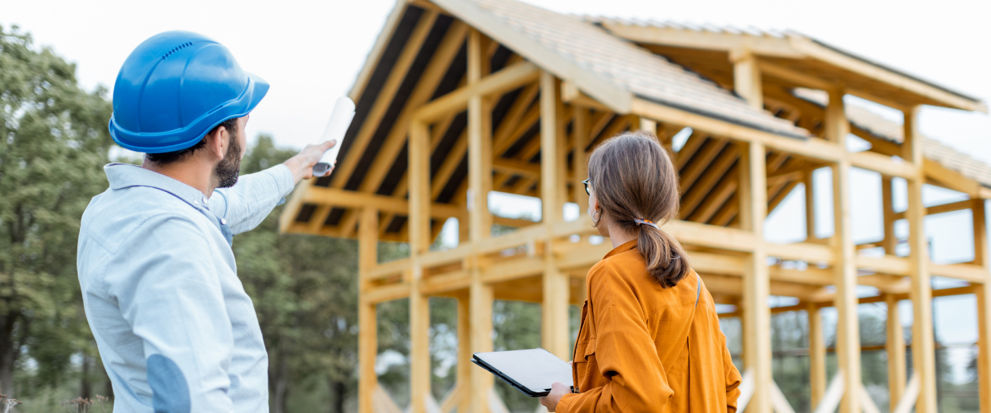 Client meeting with builder to discuss home build.