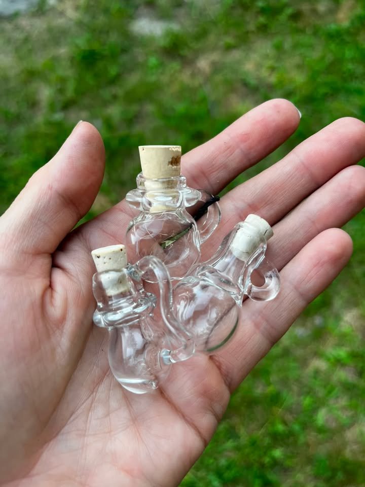 Clear pendy bottle group.jpg