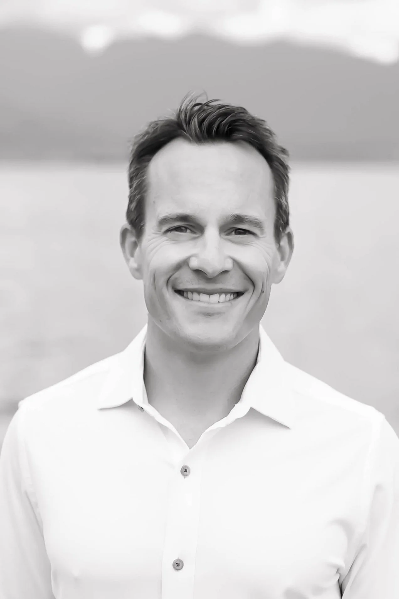 Black and white headshot of Jason Gaede, President