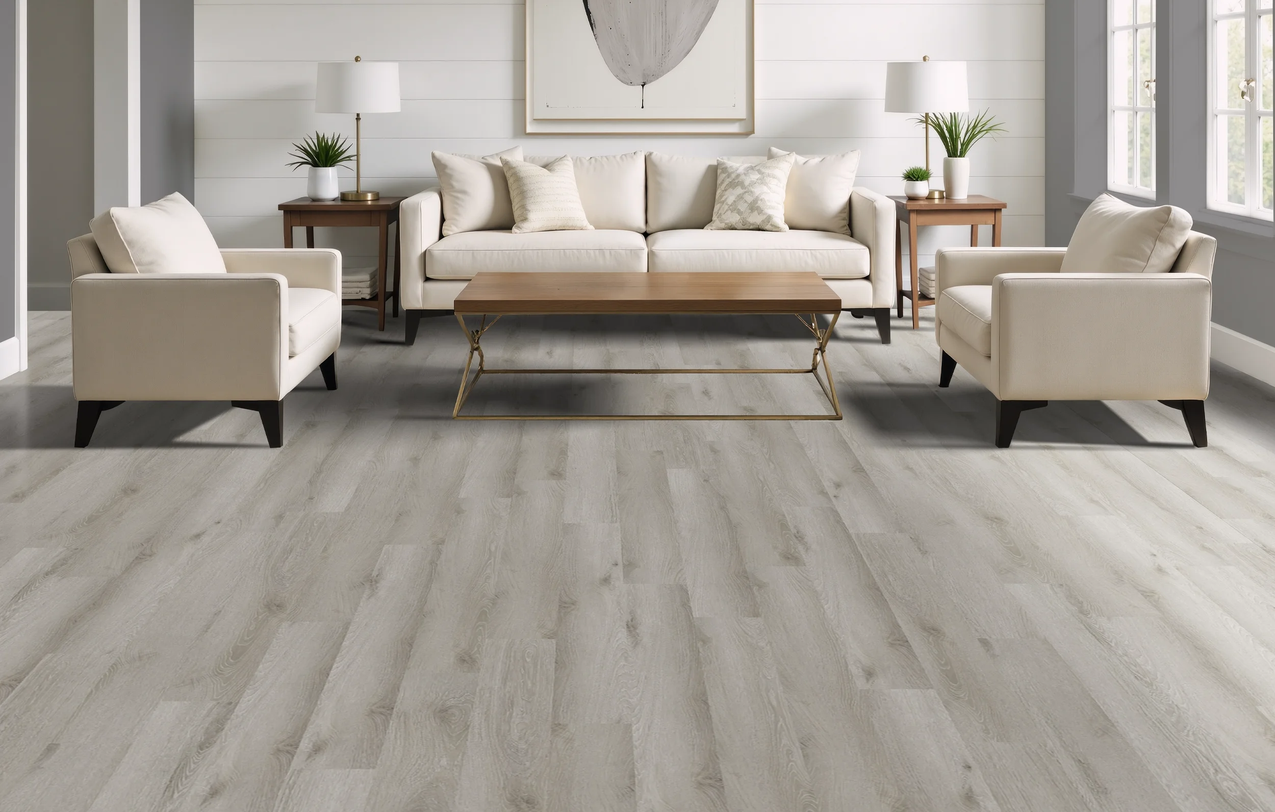 PROJEX Rigid Core vinyl flooring in Silver Oak, installed in a bright, modern living room.
