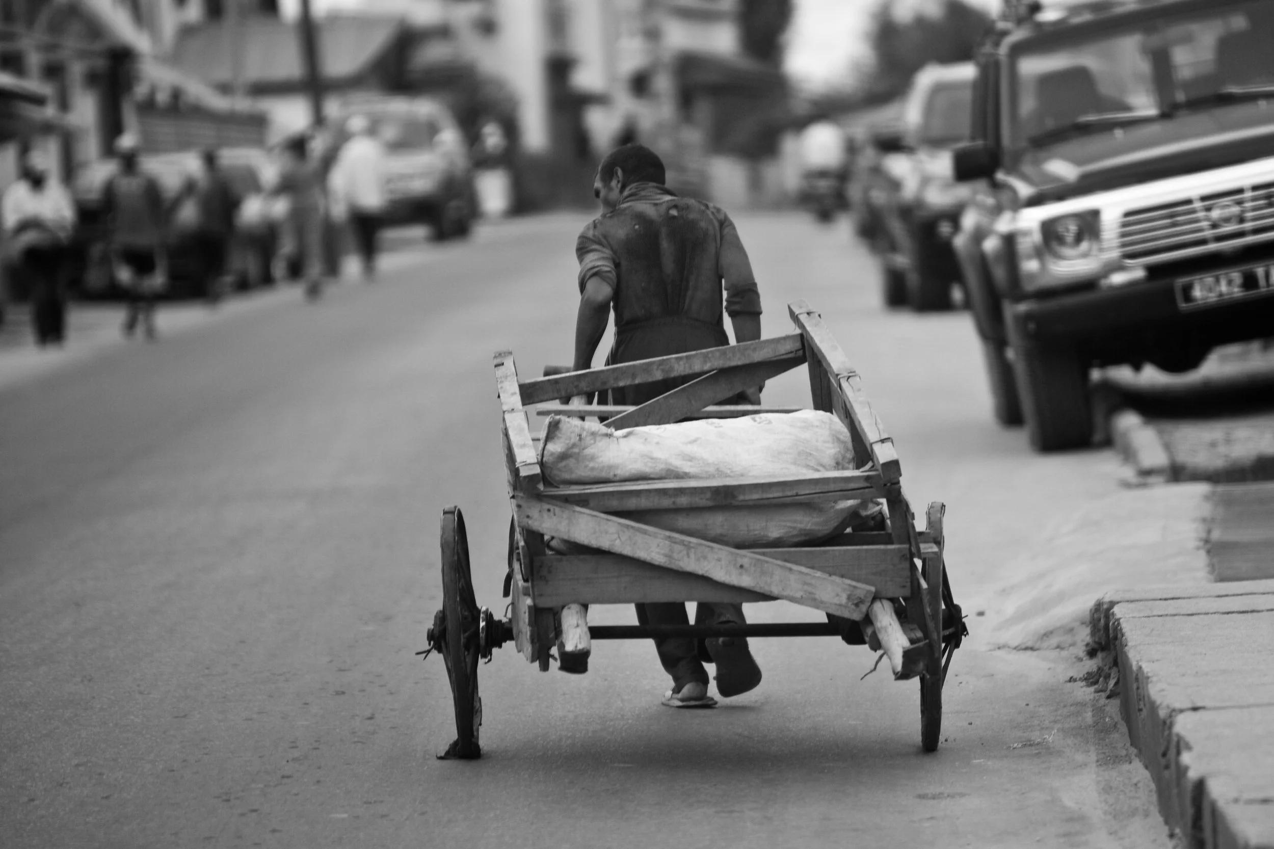 Madagascar man pulling cart