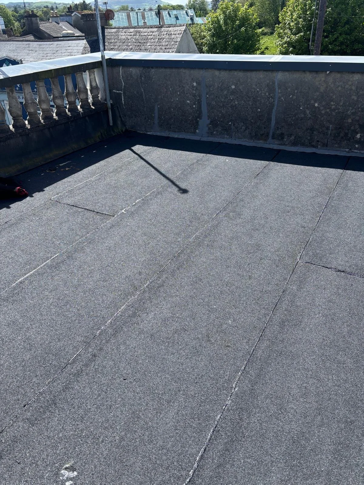 Completed felt roofing project at The Doheny Bar