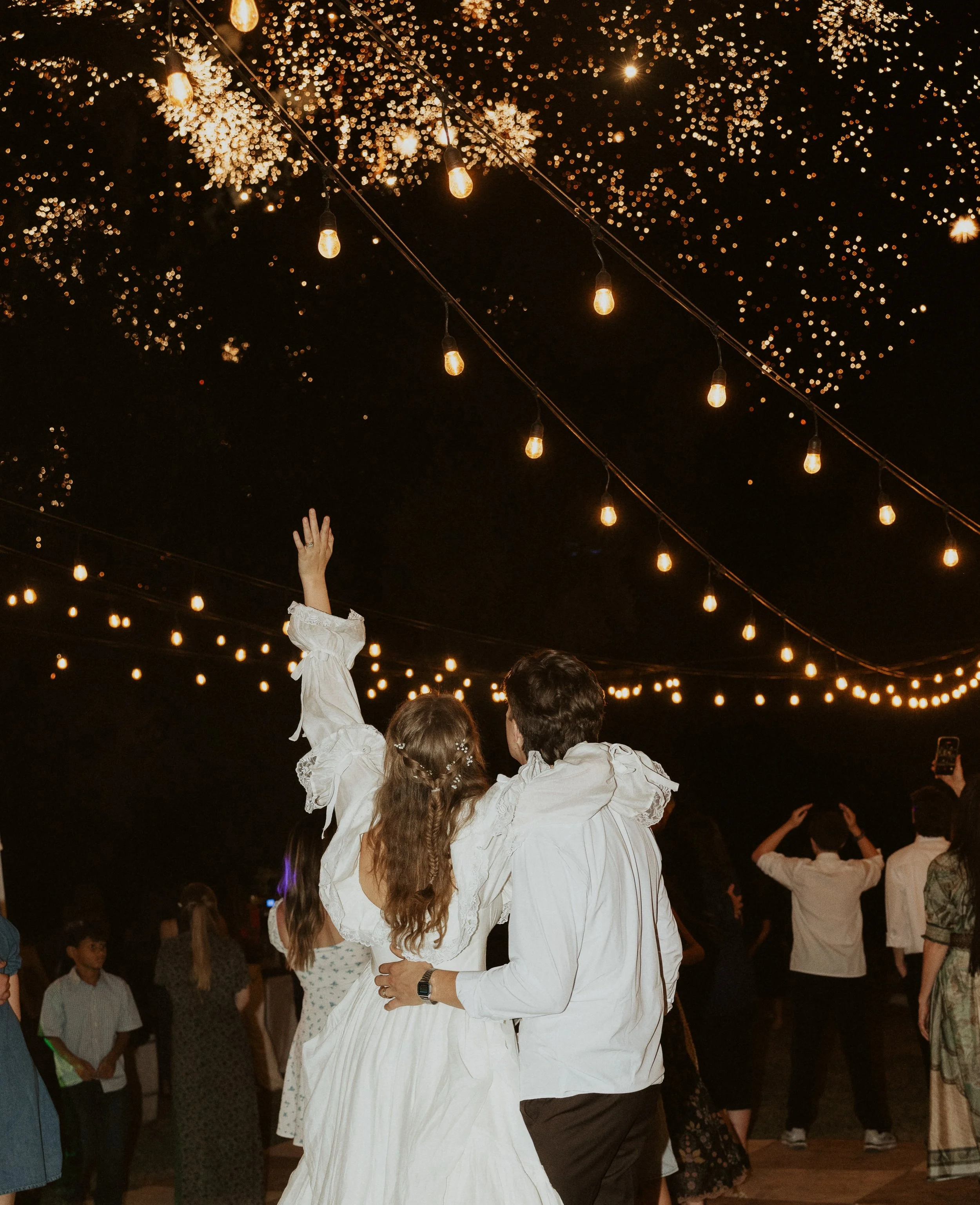 Fireworks overhead to end the night celebrating your love. 🎇 🥂🫶🏽 #weddingexit #weddingphotographer #weddinginspo