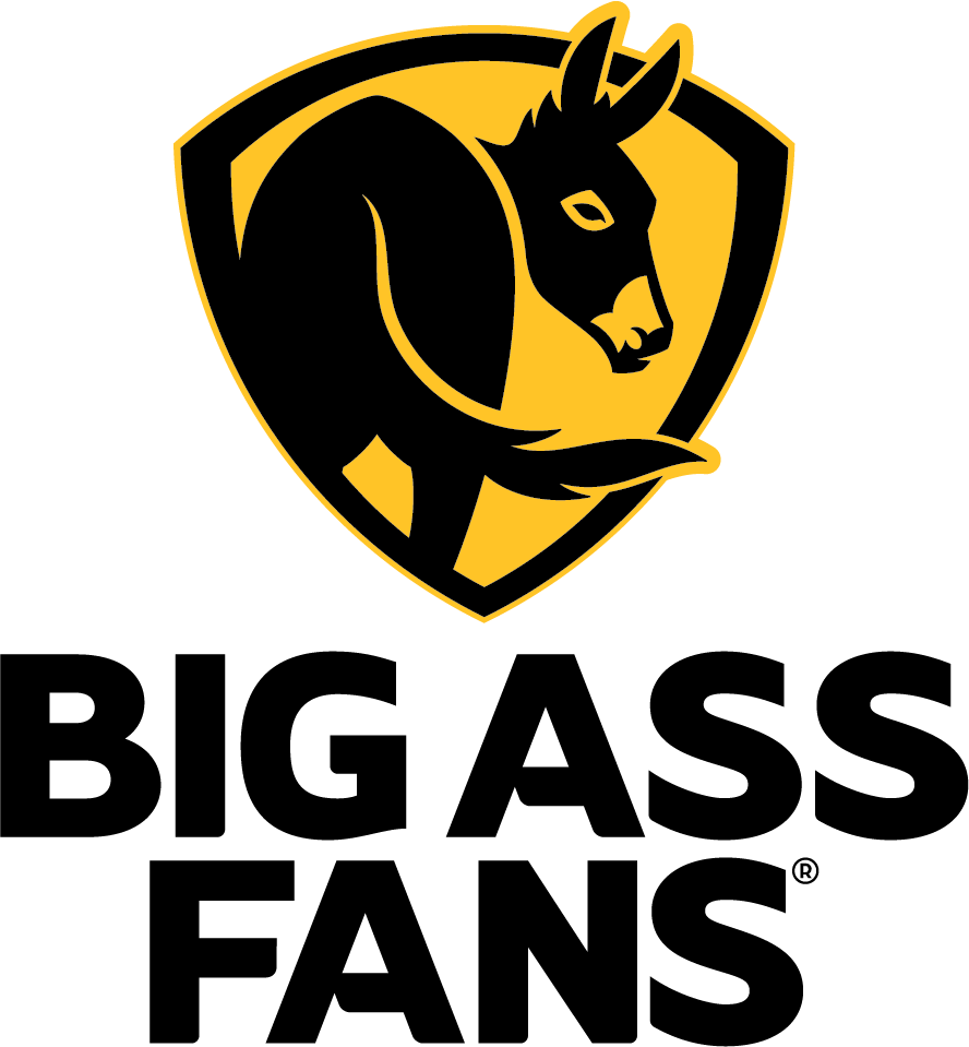 A logo featuring a black and yellow shield with a stylized goat in the center, facing to the right.
