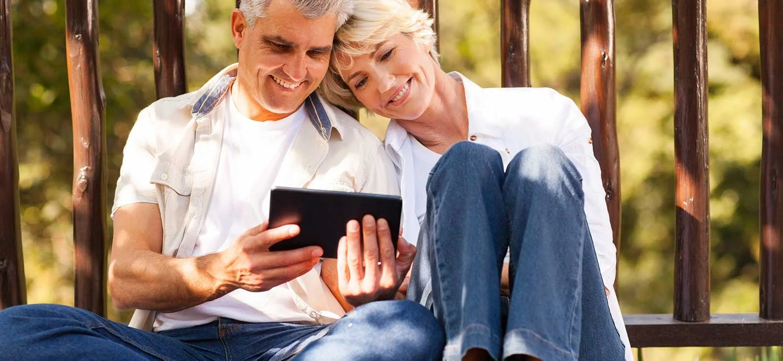 retirement planning retired couple married couple reviewing retirement plan accounts investments