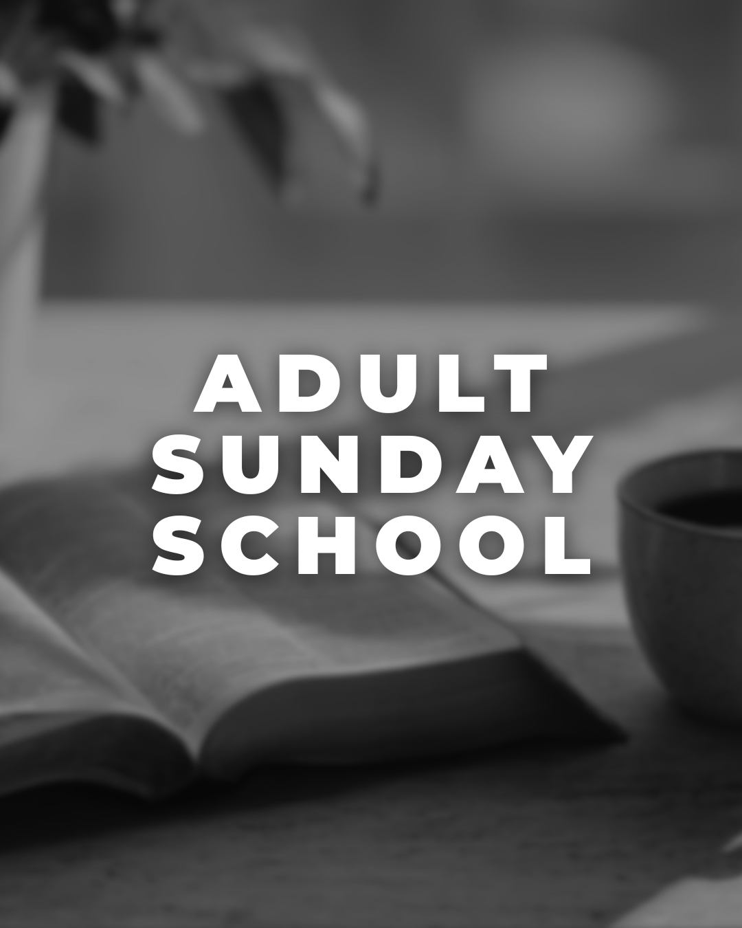 A black and white photo of an open book, a cup, and some papers on a desk, with the text "Adult Sunday School" overlaid.