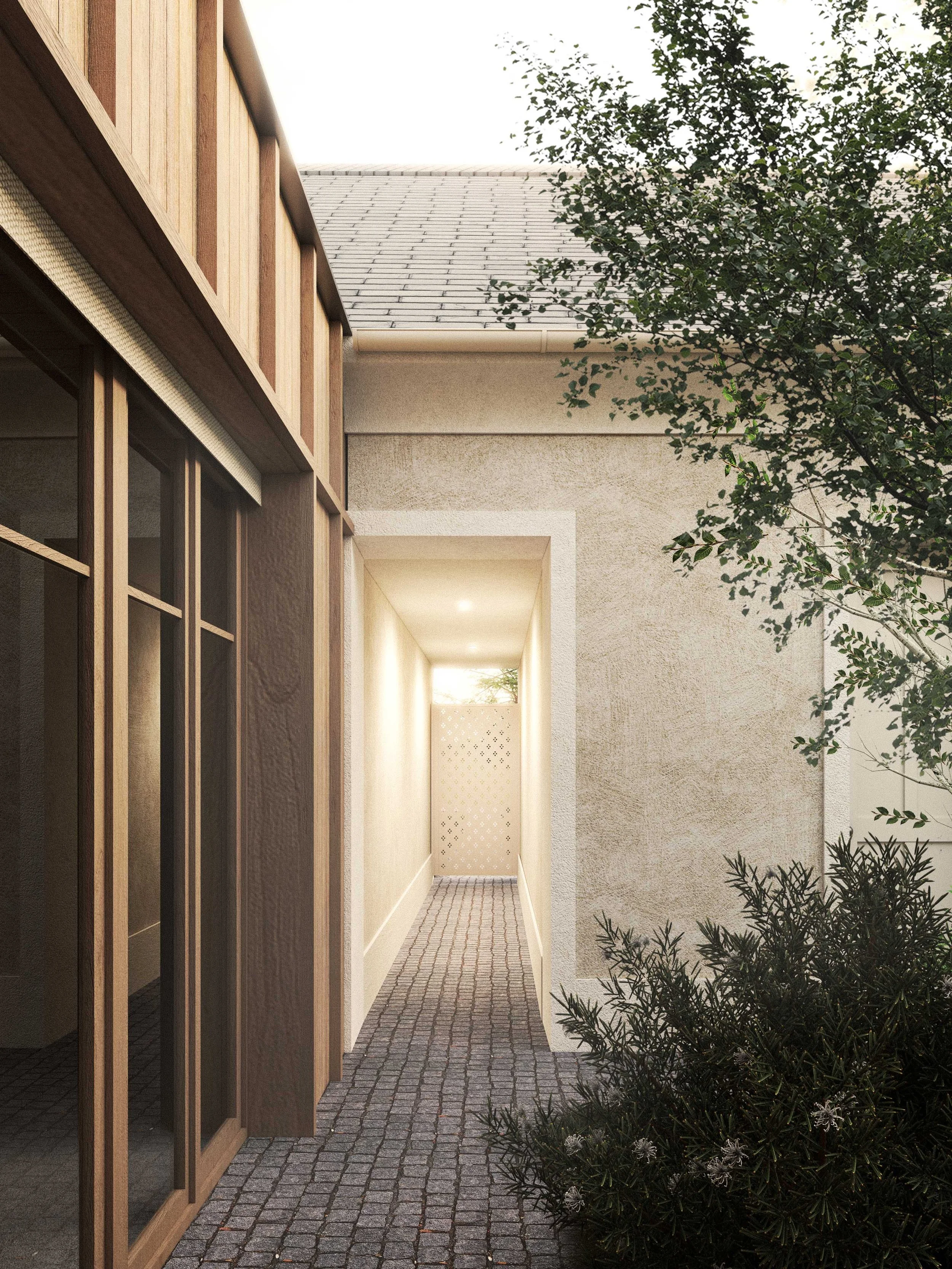 A modern house exterior featuring a wooden sectional wall and a corner hallway with a cobblestone pathway, lit by outdoor lighting, with trees and bushes nearby.