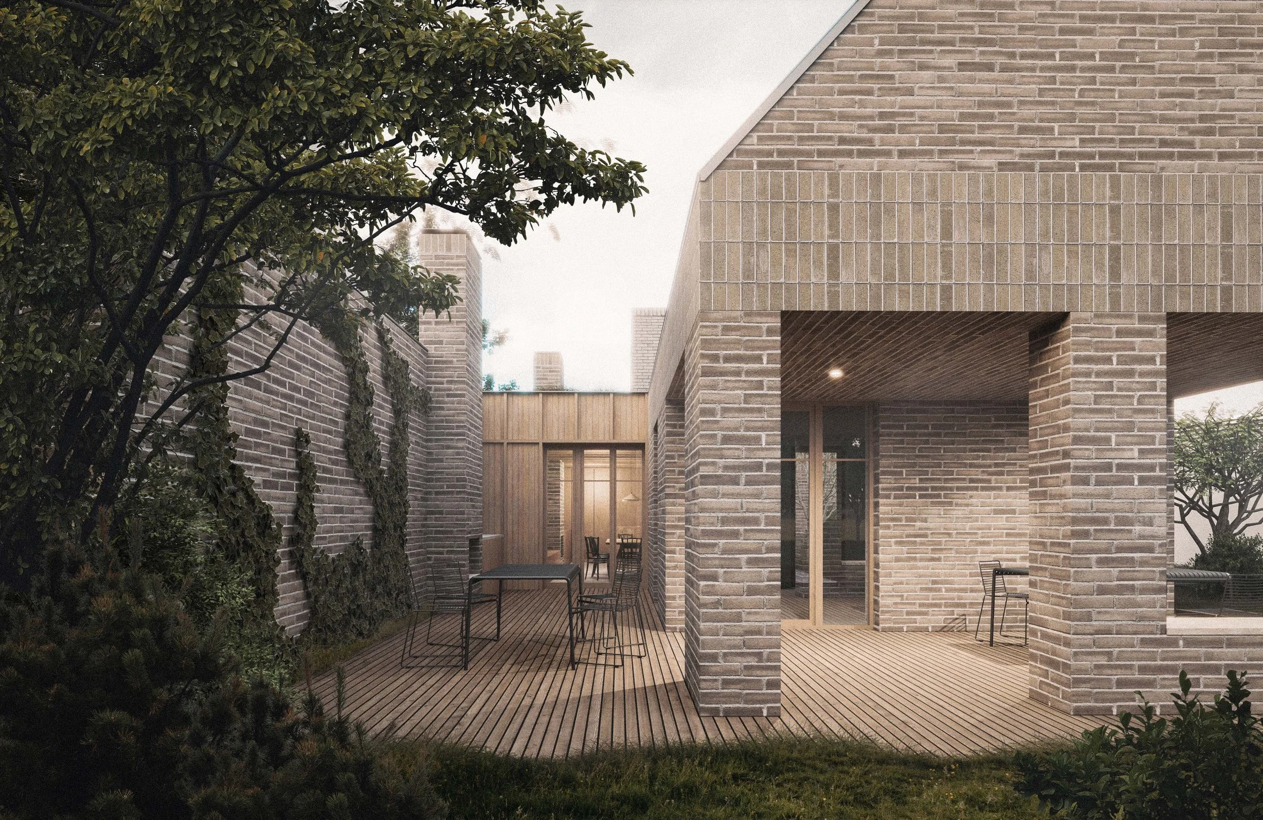 Modern brick house with covered patio and outdoor seating area, surrounded by trees and greenery.