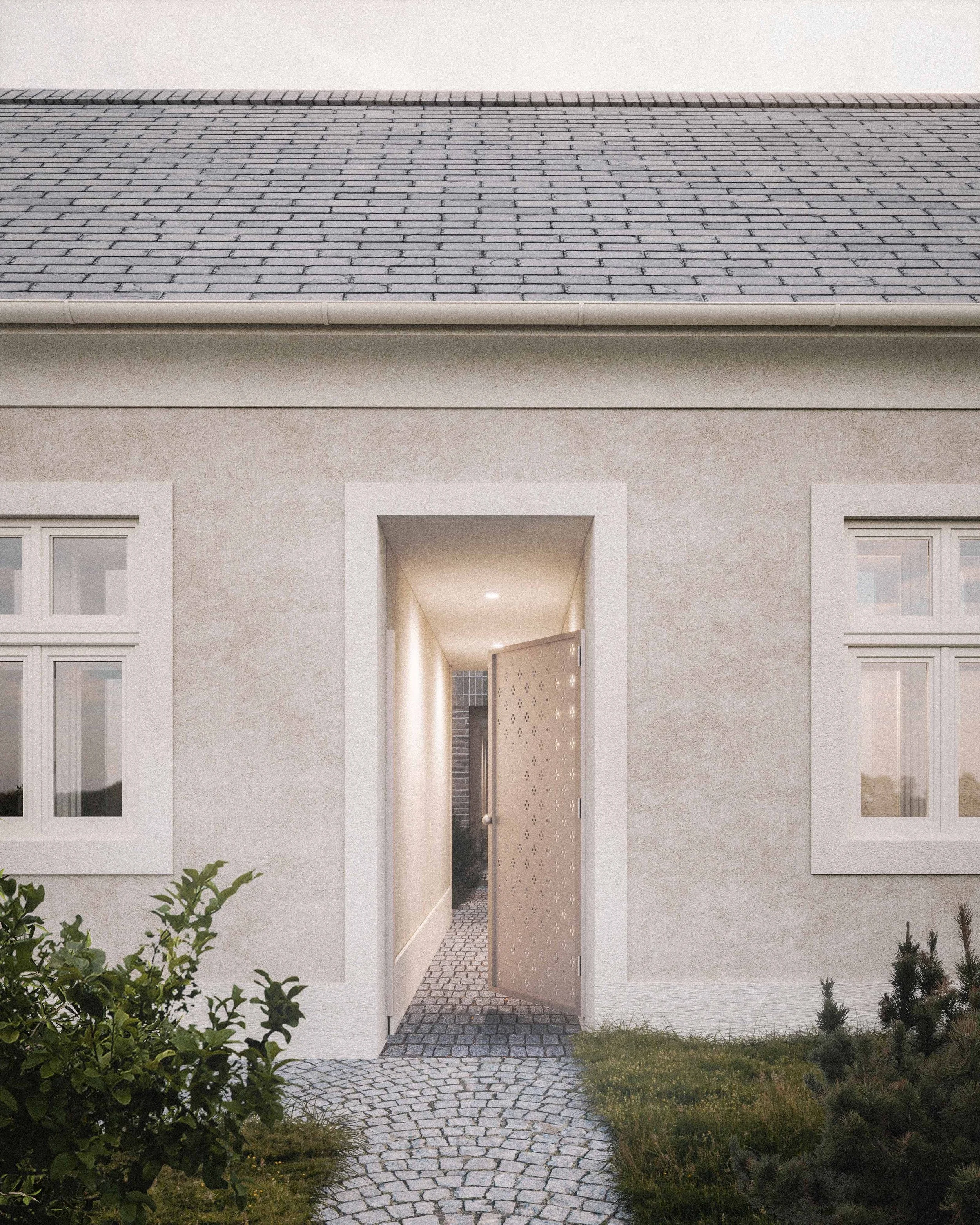 Modern house entrance with an open wooden door, stone pathway, white exterior walls, and small shrubbery and plants in the garden.