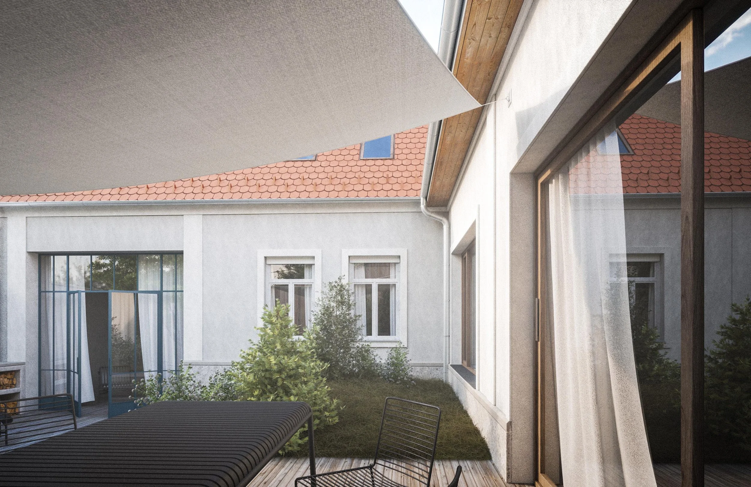 View of a modern house exterior with a patio, garden, and large window, featuring a red tiled roof and wood accents.