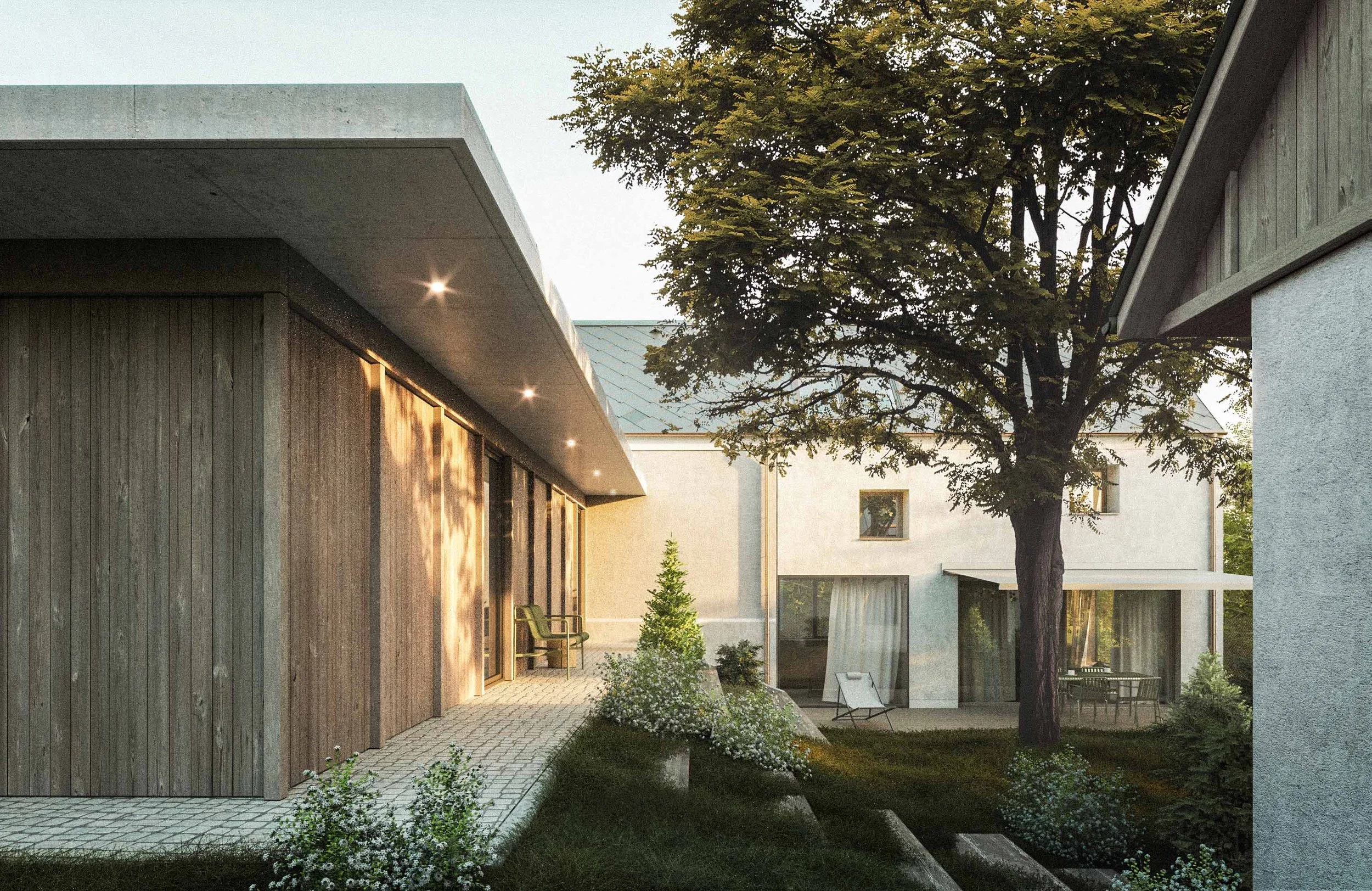 Modern residential house with large glass windows, wooden and concrete exterior, surrounded by greenery and a garden with a tree, outdoor seating, and a paved walkway.