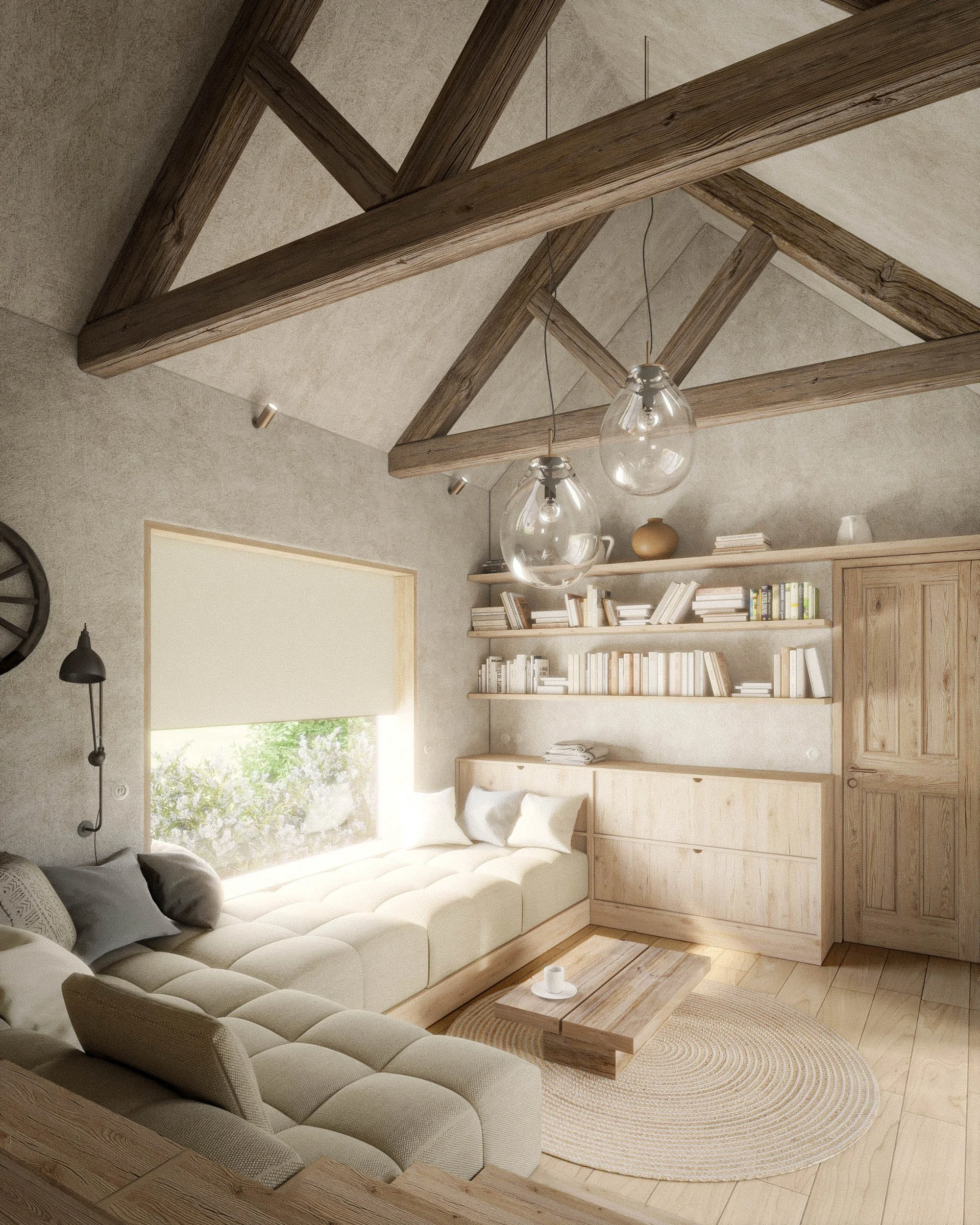 Living room with a large white couch, wooden coffee table, bookshelves filled with books, hanging glass pendant lights, a window with a view of trees, and a beige circular rug.