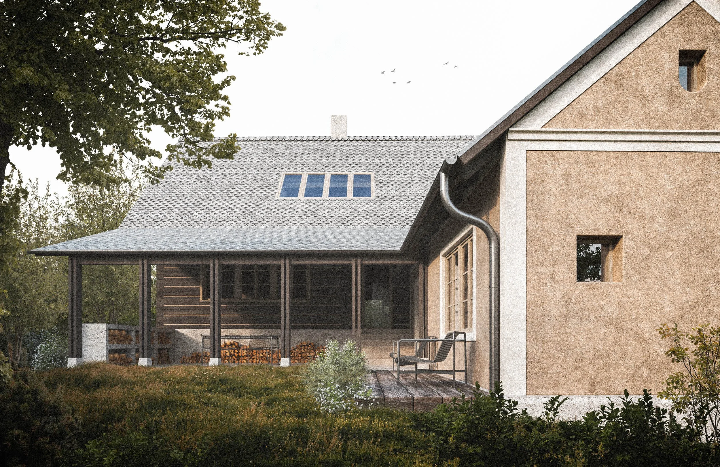 A house with a gray tiled roof, three skylights, and beige exterior walls, surrounded by trees and a garden area.