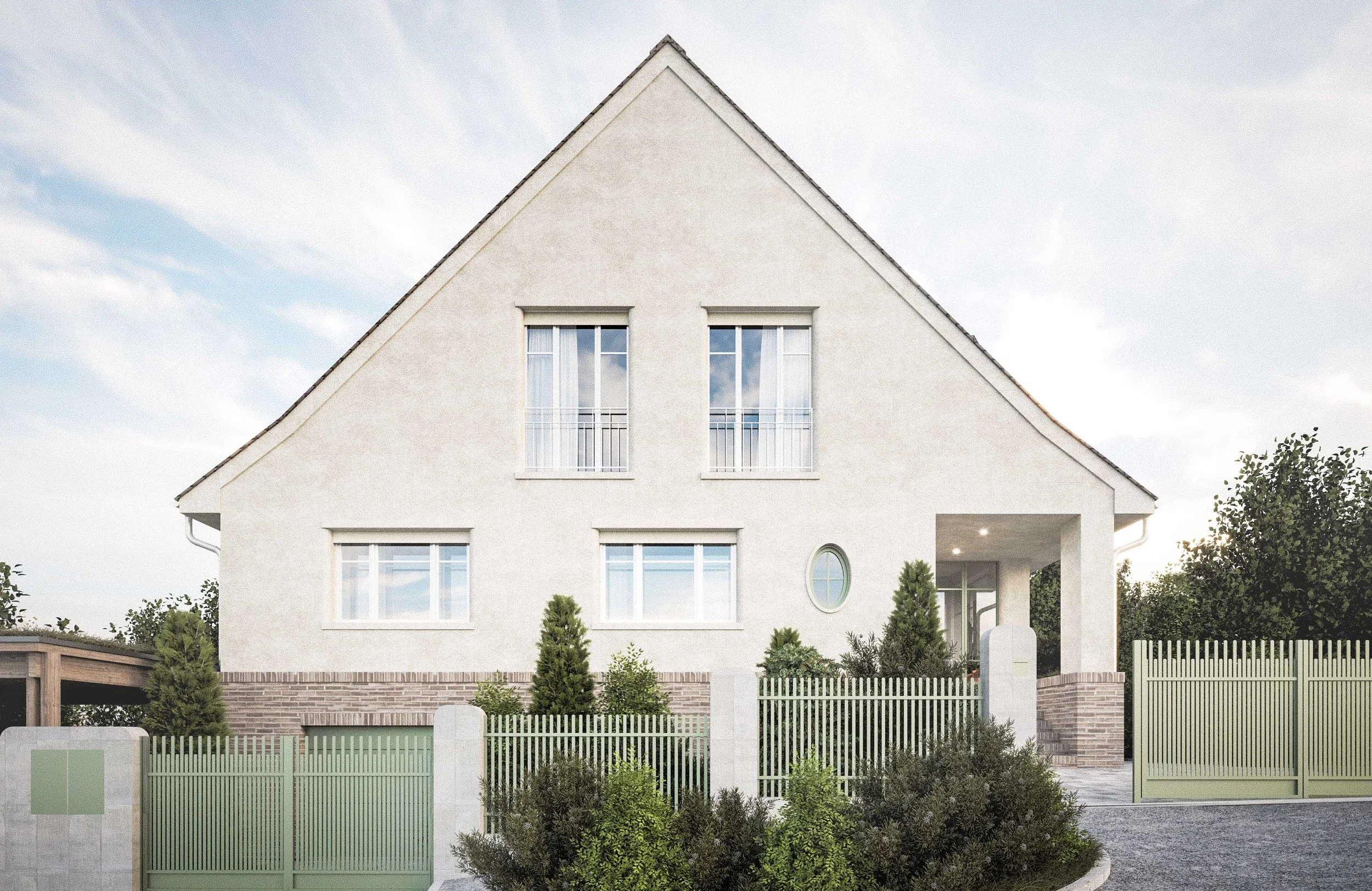 A modern house with a steep gable roof, white exterior walls, large windows with balcony railings, surrounded by a white picket fence, with trees and shrubs in the yard.