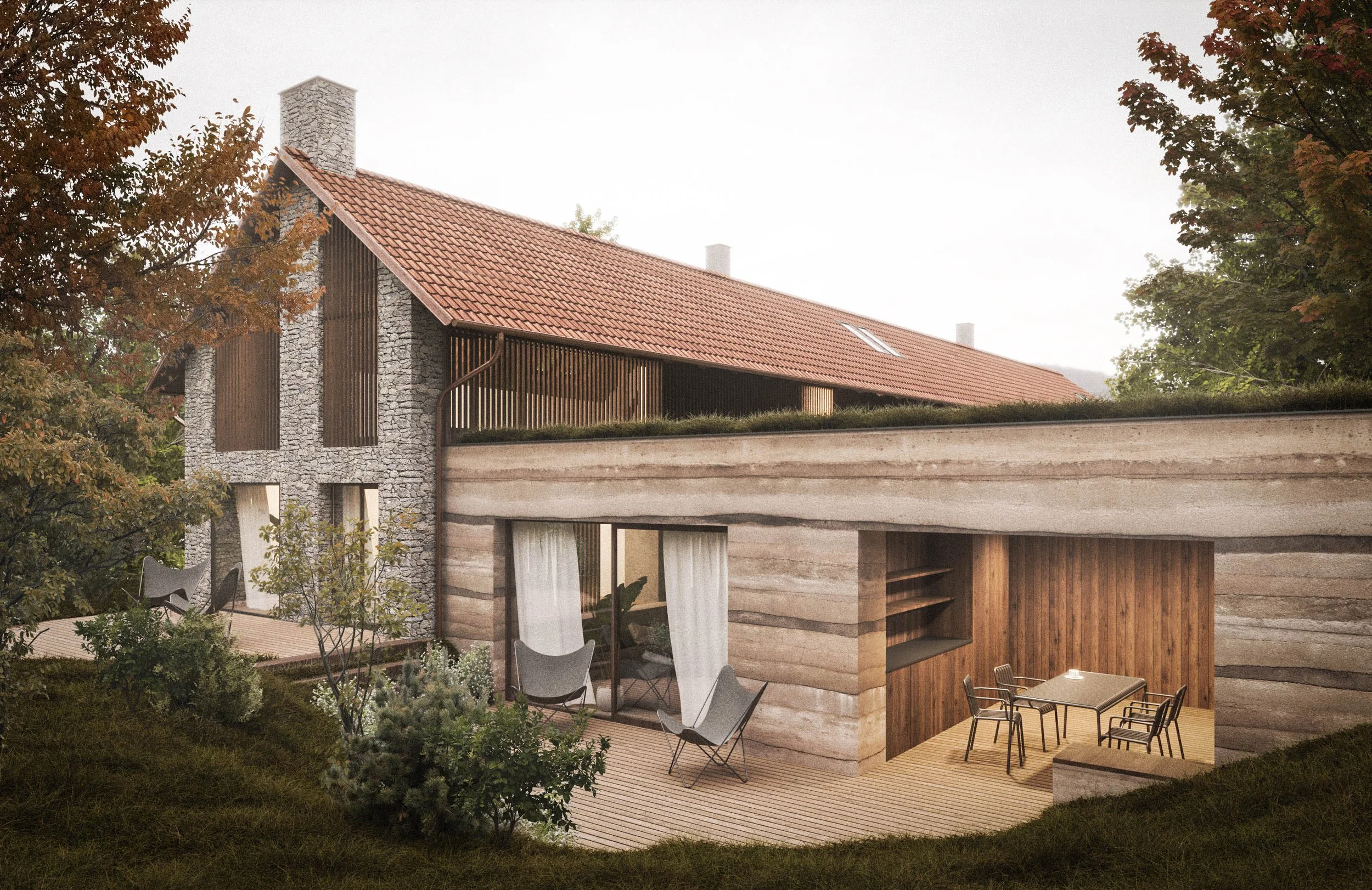 Modern house with stone and wood exterior, red tile roof, surrounded by trees, outdoor patio with table, chairs, and lounge chairs.