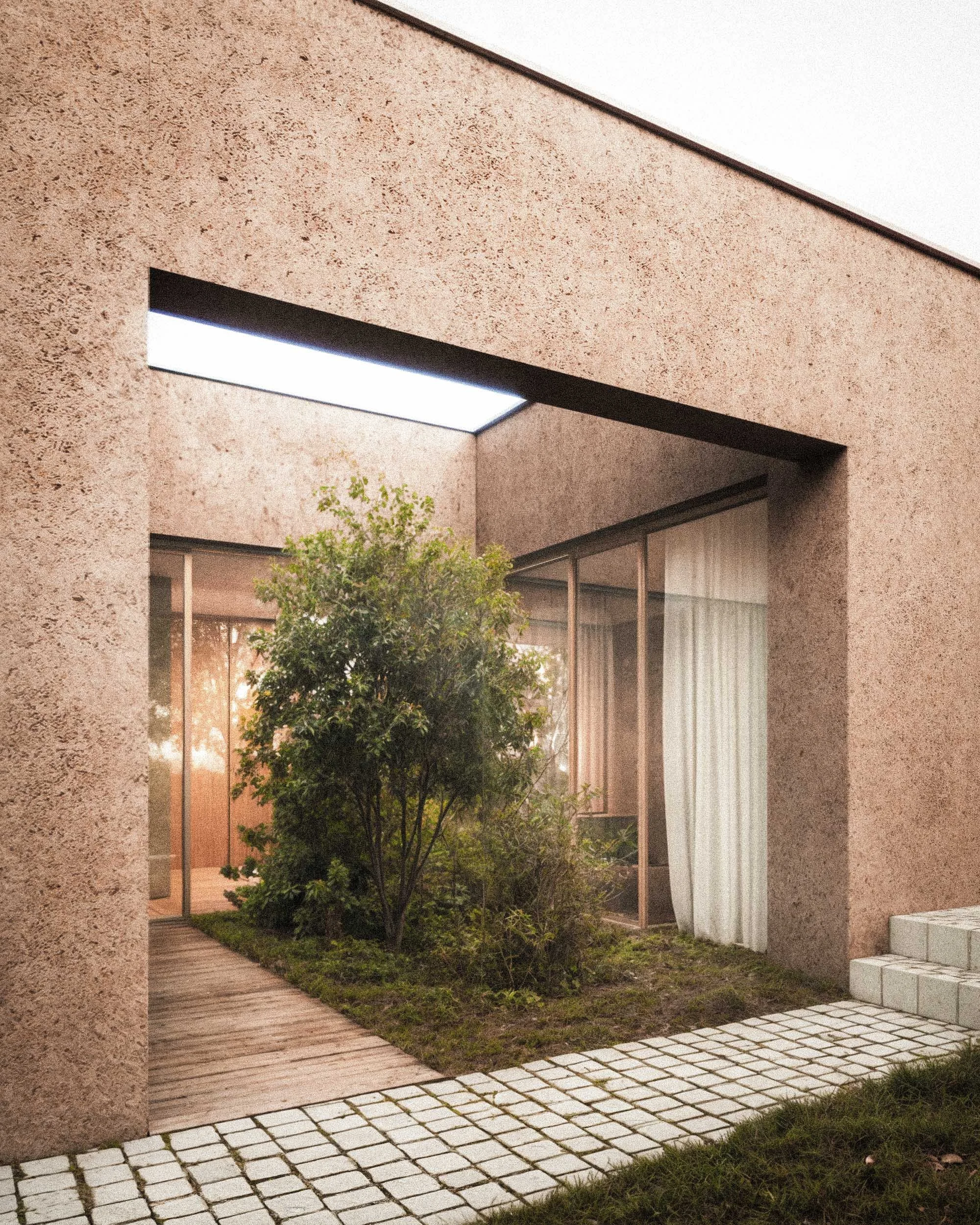 Exterior of a building with a textured beige wall, a large window with sheer curtains, a small tree or shrubbery, and a pathway with white paving stones.