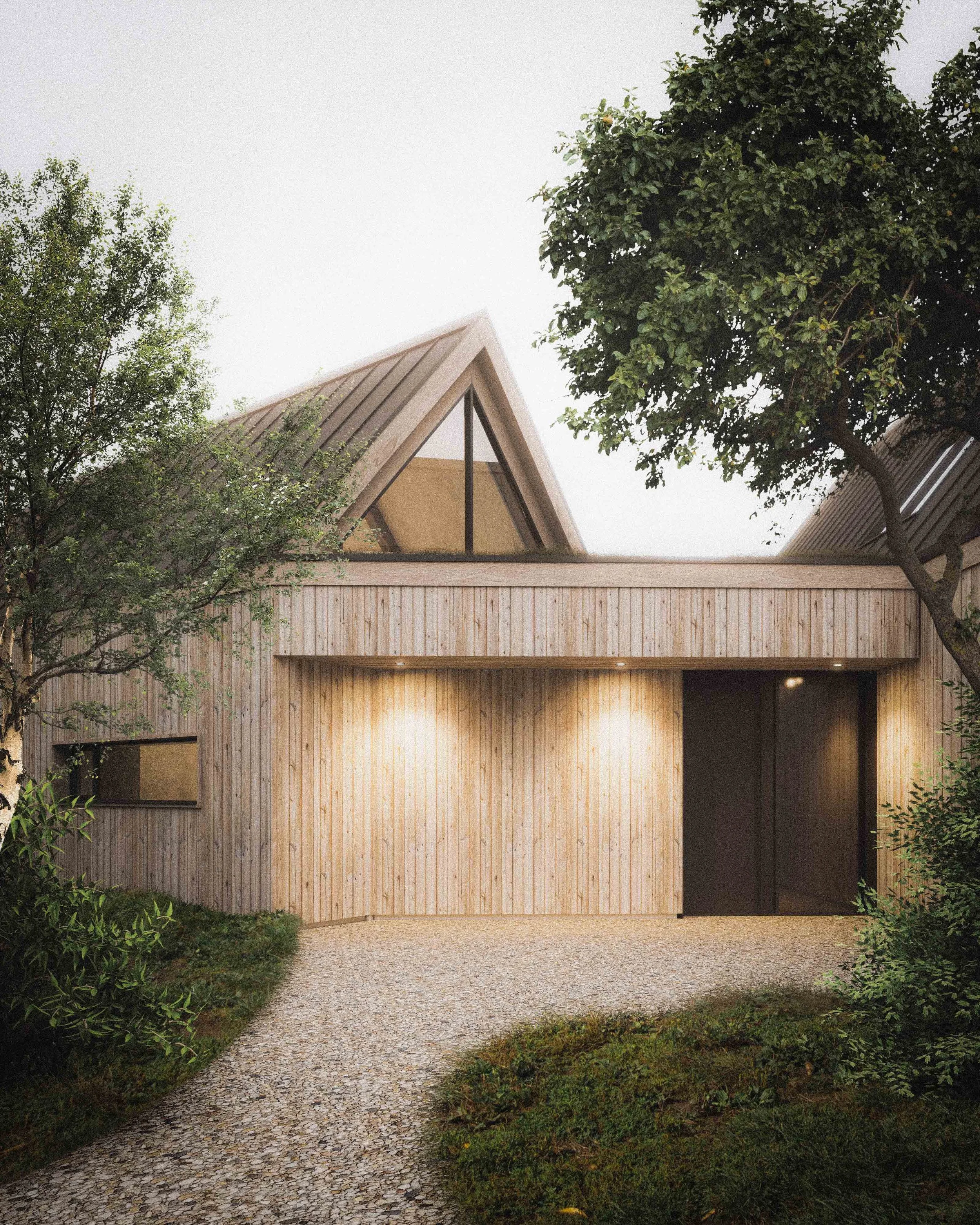 Modern house with triangular roof and large windows, surrounded by trees and a gravel pathway.